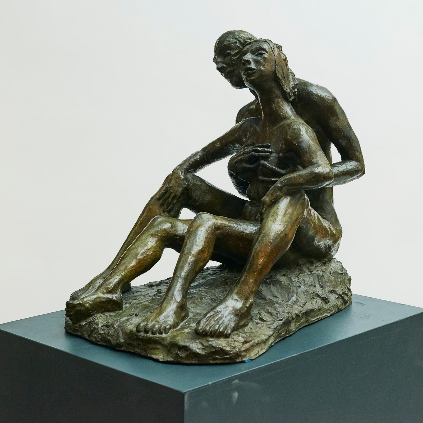 bronze statues of couples
