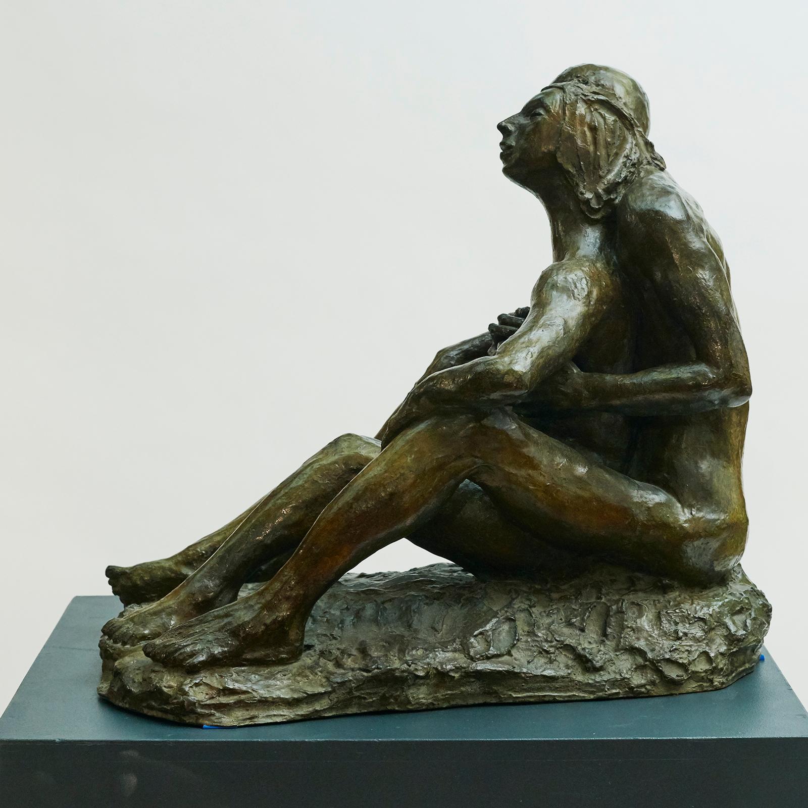 bronze statues of couples