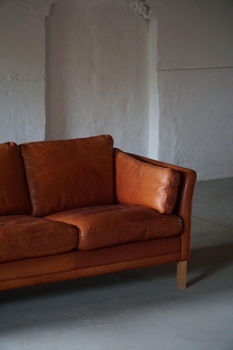 Two and a half seat leather sofa by Mogens Hansen – CHASE & SORENSEN