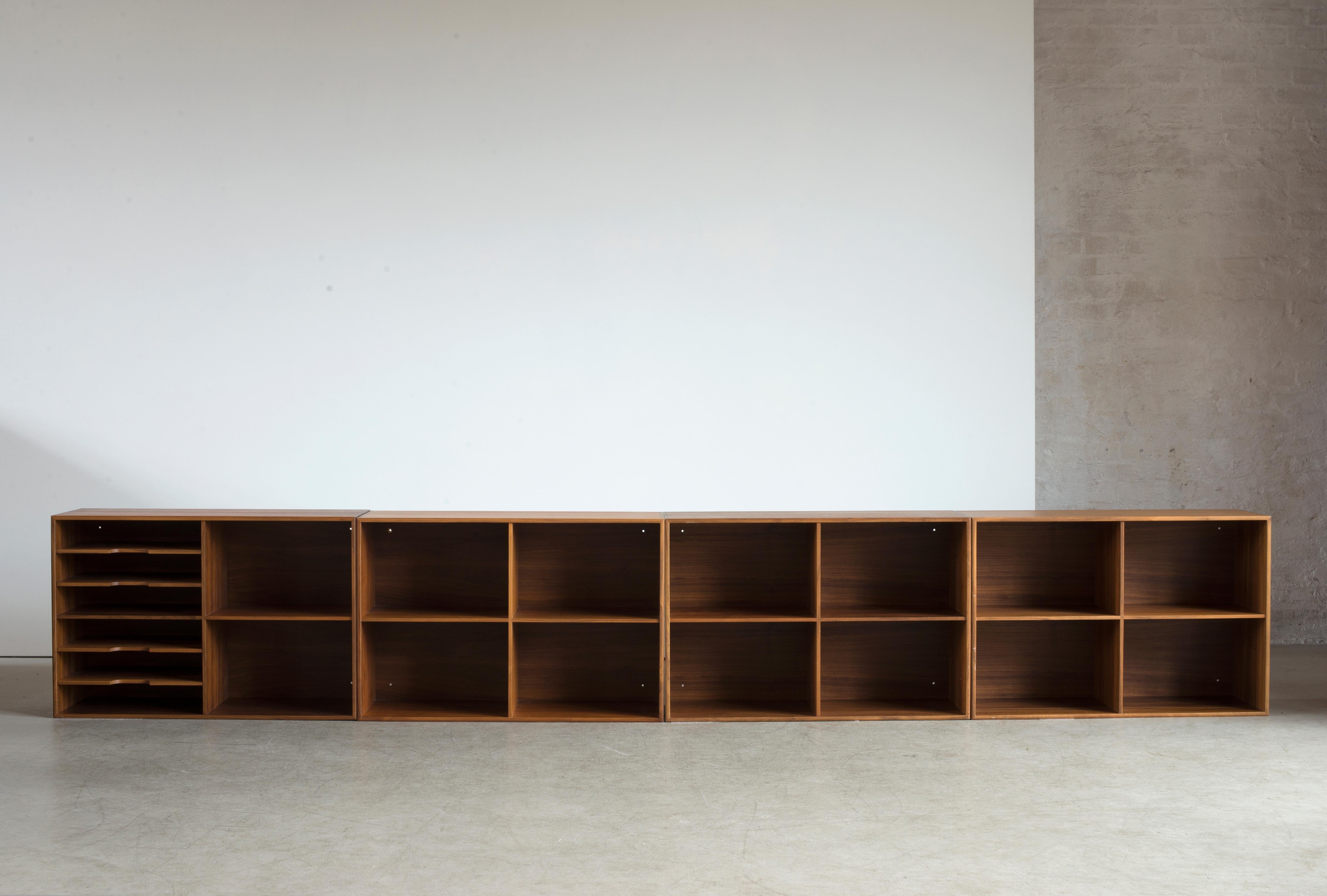 Mogens Koch four wall-mounted bookcases in walnut. Executed by Rud Rasmussen.

Reverse with paper labels ‘RUD. RASMUSSENS/SNEDKERIER/KØBENHAVN/DENMARK.