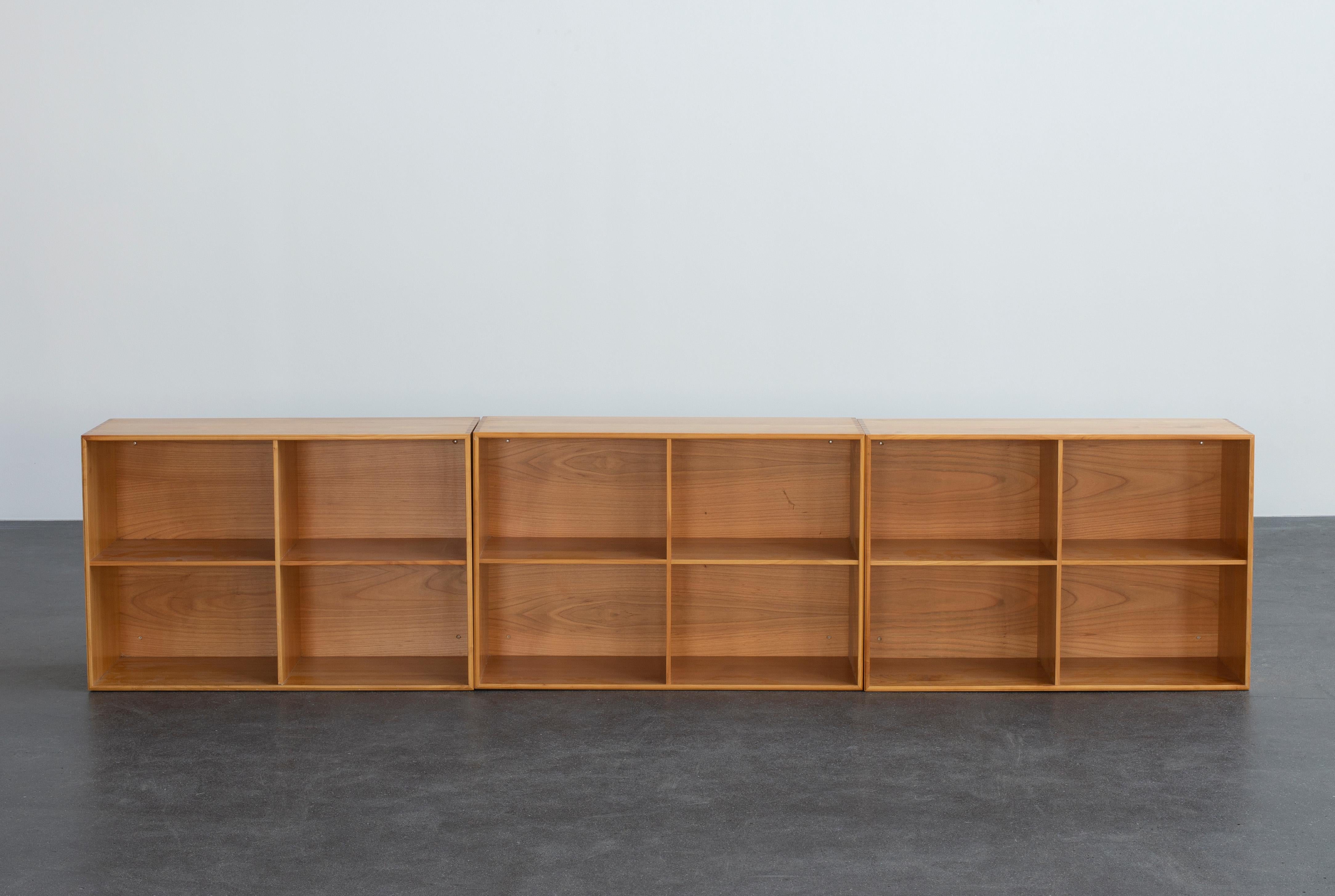 Mogens Koch set of three bookcases in cherrywood. Executed by Rud Rasmussen.

Reverse with paper labels ‘RUD. RASMUSSENS/SNEDKERIER/KØBENHAVN/DENMARK.