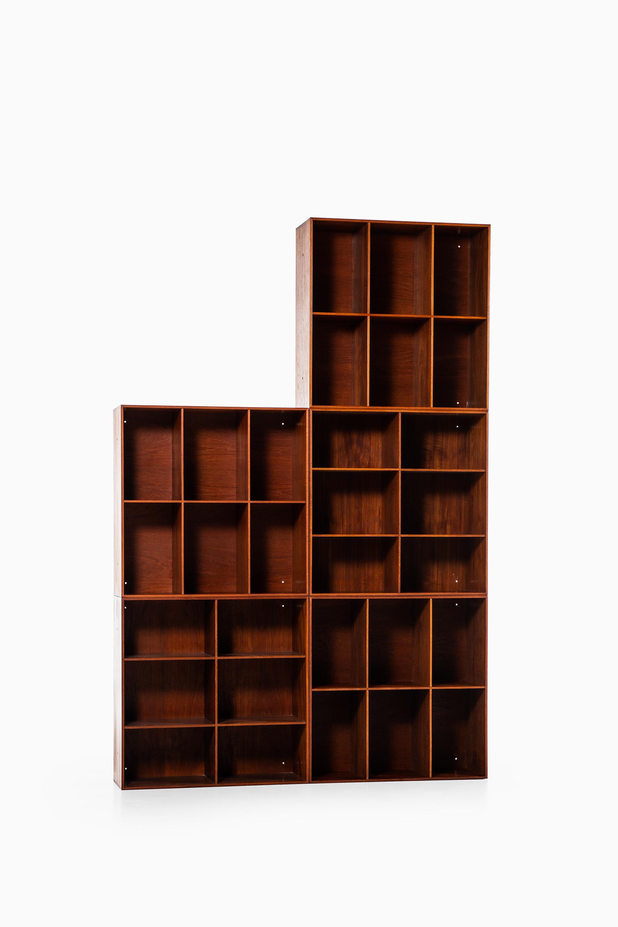 Set of 5 bookcases designed by Mogens Koch. Produced by Rud Rasmussen in Denmark.