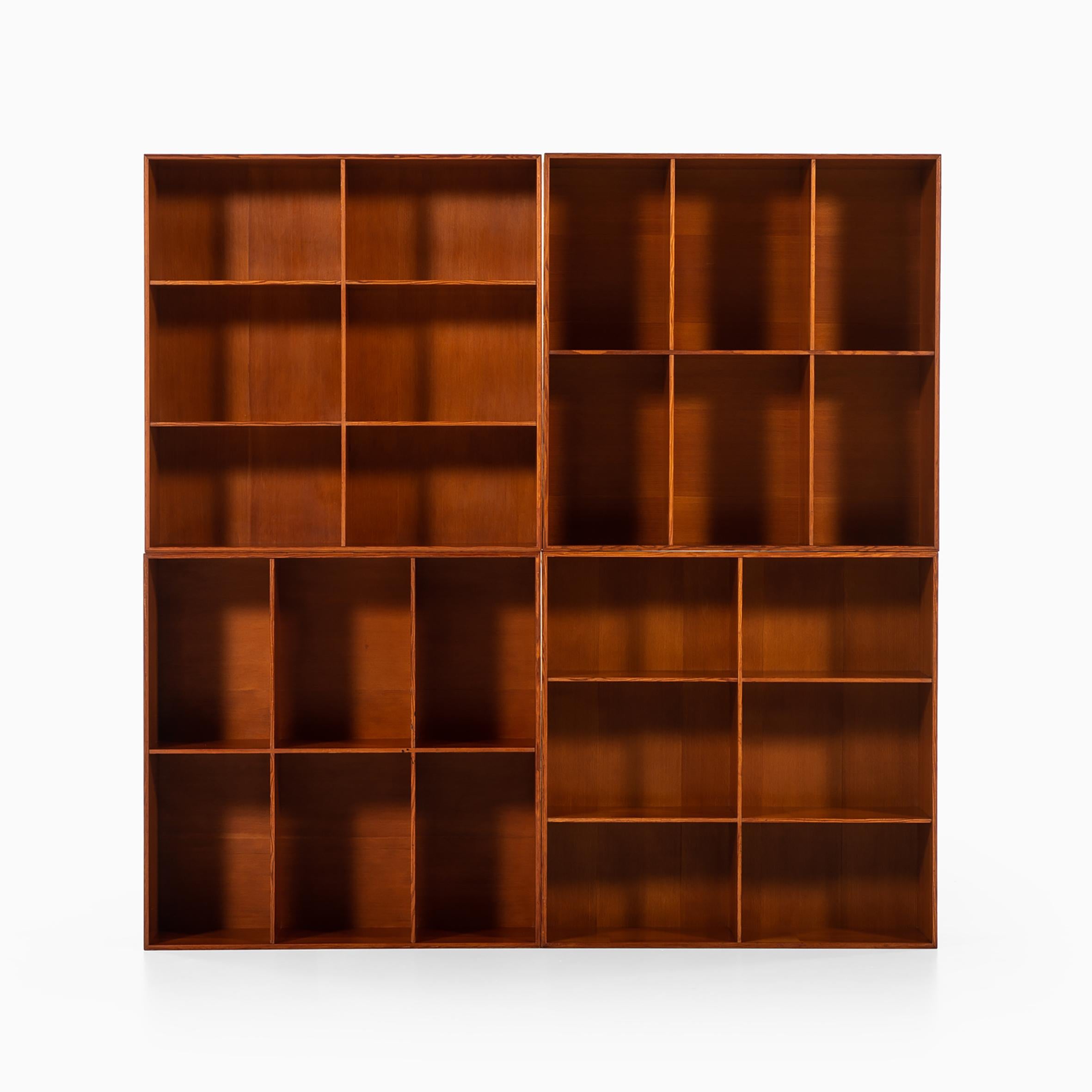Mogens Koch

Four bookcases

Four square Oregon pine bookcases each with six rectangular cases.
Labeled on the back « Rud.Rasmussens, Snedkerier, 45 Nørrebrogade, København, 22860 ».
Produced by Rud Rasmussen.
Denmark.
Circa