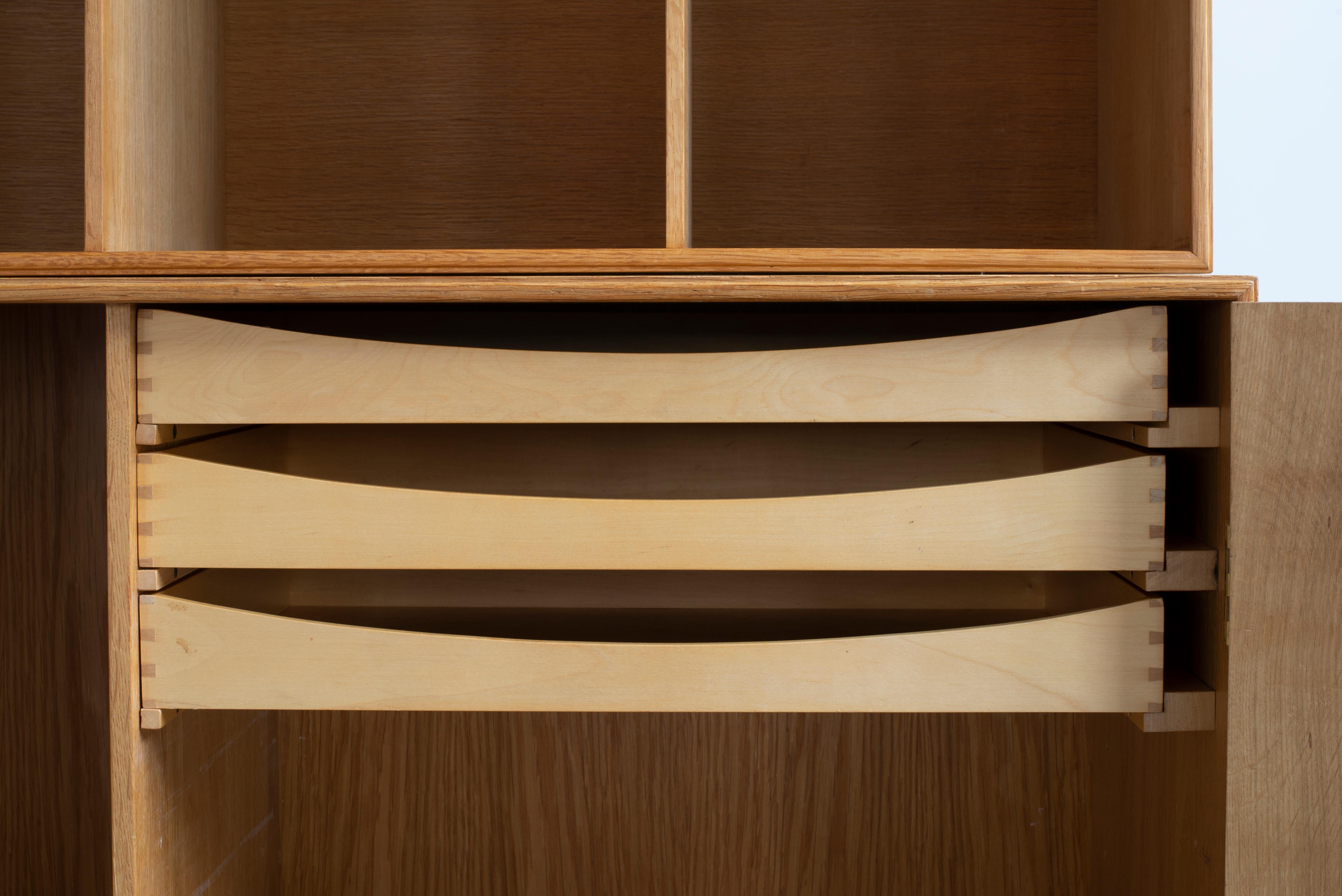 Polished Mogens Koch Cabinets and Bookcases in Oak for Rud. Rasmussen For Sale