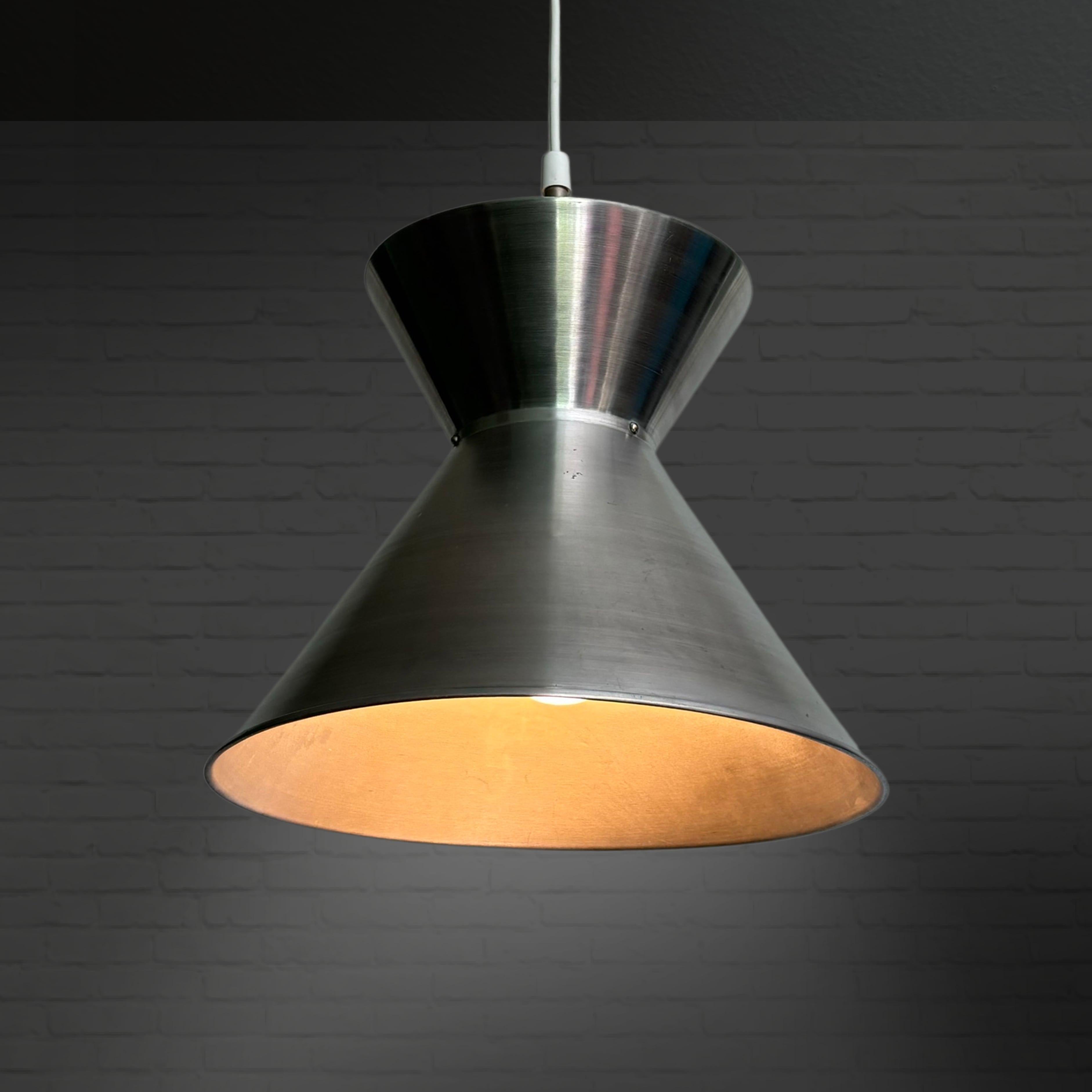 A double cone Laboratory pendant lamp model 16453 designed by the Danish architect Mogens Koch for Louis Poulsen. Specifically designed in the late 1950s to be used at the Royal Veterinary and Agricultural University in Copenhagen. Initially