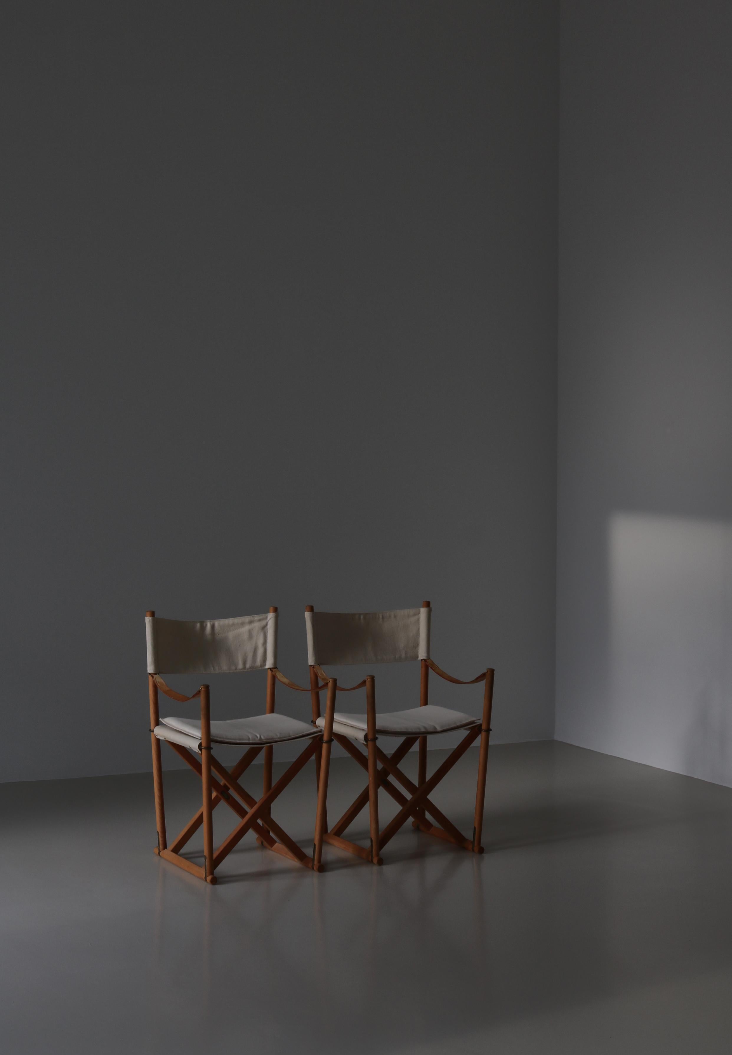 An original pair of Mogens Koch folding chairs model 