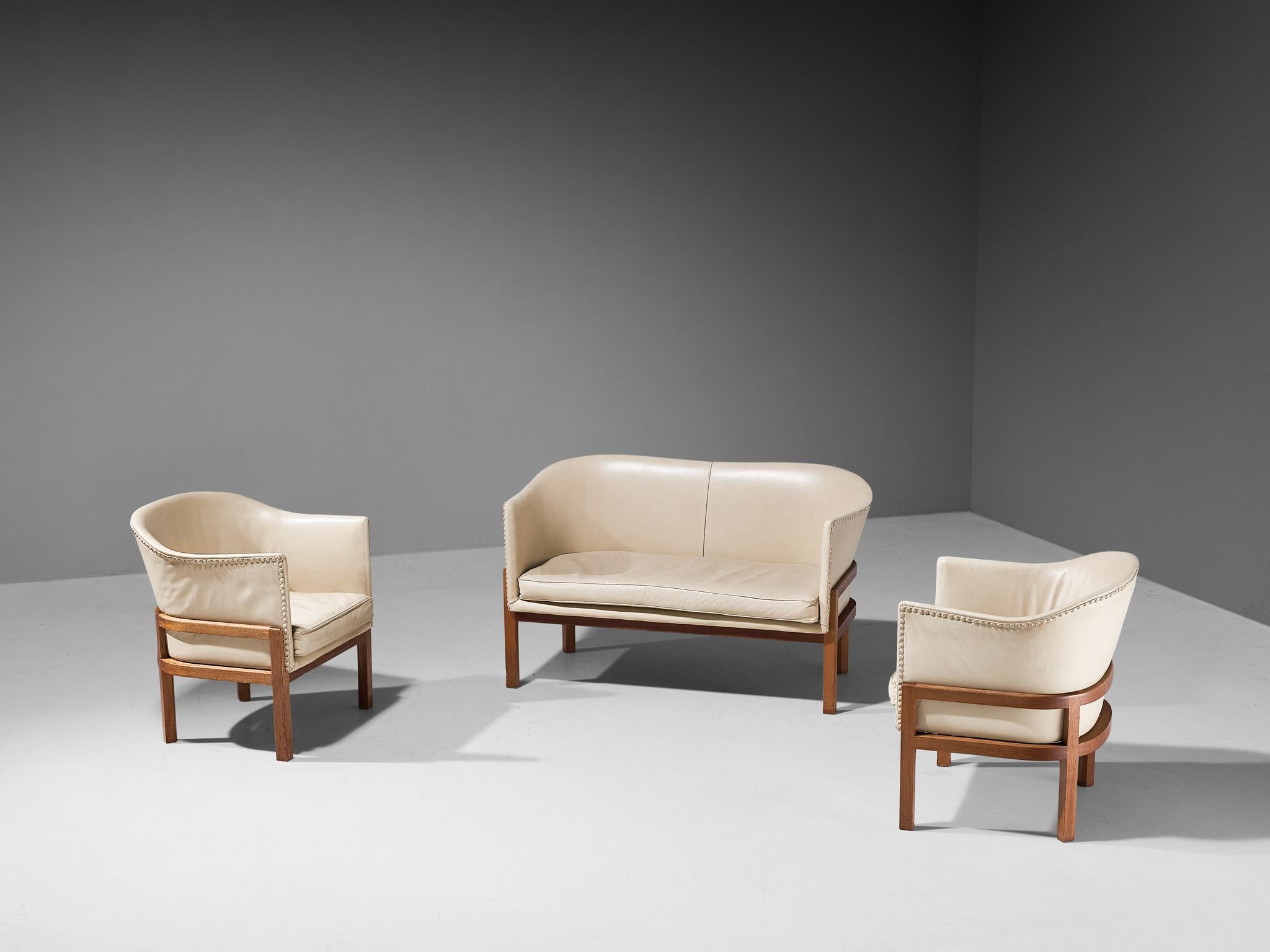 Mogens Koch for Ivan Schlechter, 'Kamin' living room set consisting of one sofa and pair of armchairs, model MK51, mahogany, leather, Denmark, design 1936, manufactured after 1951 

Mogens Koch's 'Kamin' living room set is inspired by Kaare Klint's