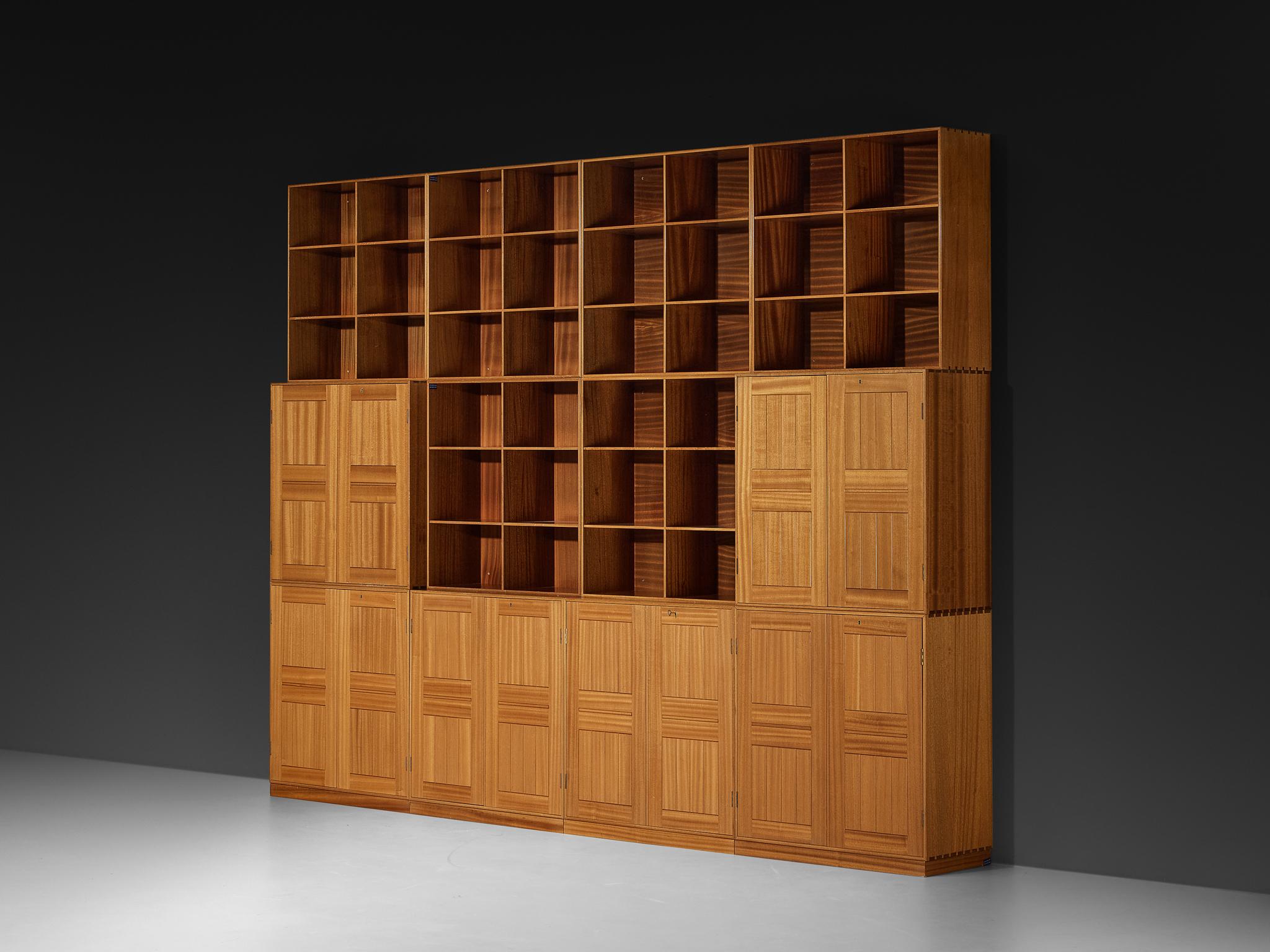 Mogens Koch for Rud Rasmussen, modular bookcase, mahogany, Denmark, design 1928 

Modular sideboard or book case by Danish designer Mogens Koch. This piece is constructed from  elements to create this lovely set up. The execution of this design is