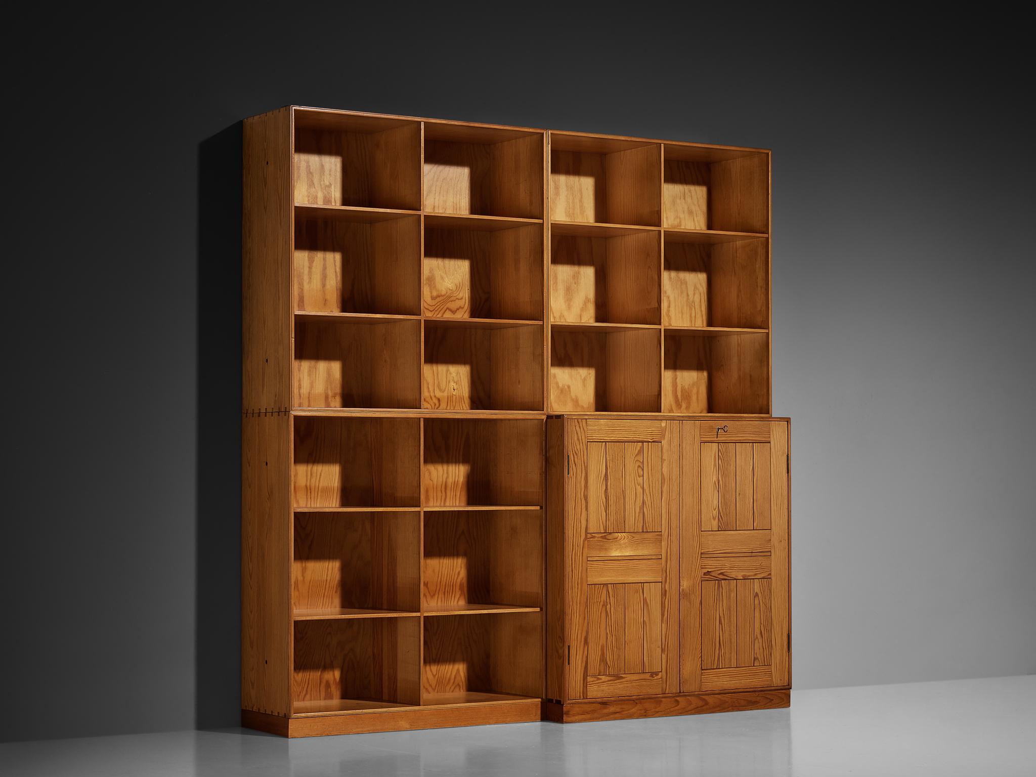 Mogens Koch for Rud Rasmussen, modular bookcase, pine, Denmark, design 1928 

Modular highboard or book case by Danish designer Mogens Koch. This piece is constructed from different elements to create this lovely set up. The execution of this design