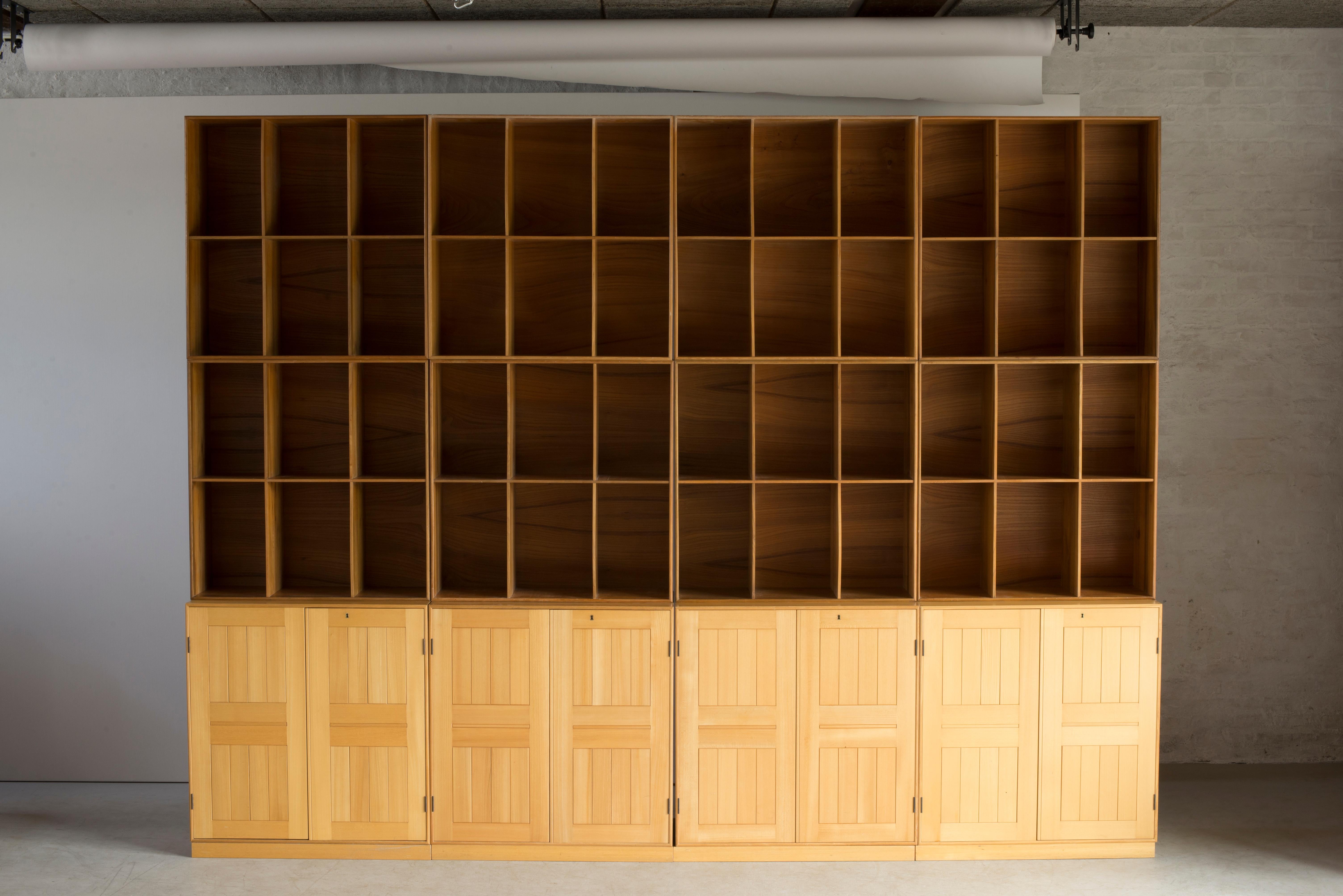 Mogens Koch cabinets and bookcases in elm. Executed by Rud Rasmussen

Reverse with paper labels ‘RUD. RASMUSSENS/SNEDKERIER/KØBENHAVN/DENMARK.