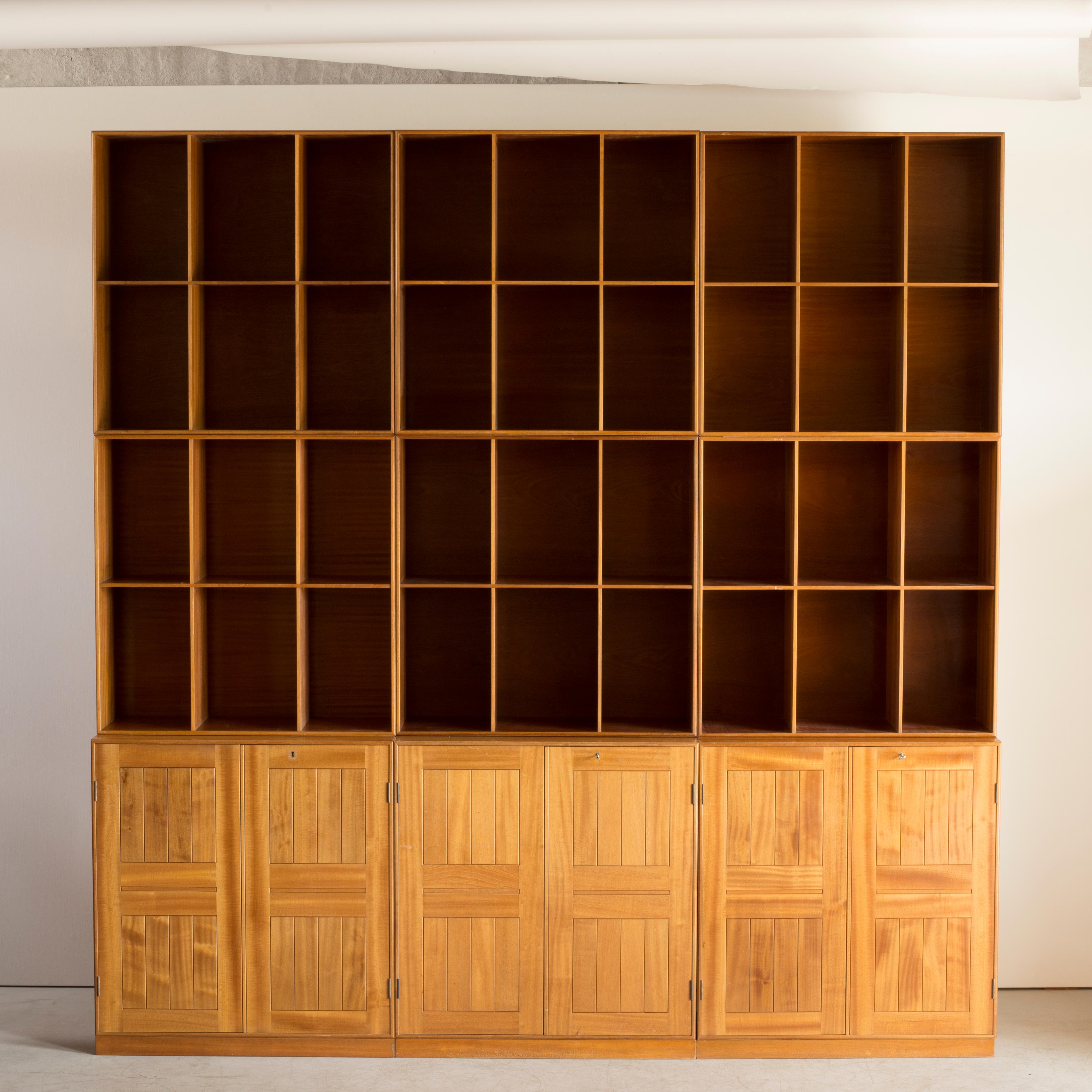 Mogens Koch library of mahogany. Three cabinets and six bookcases. Executed by Rud Rasmussen.

Reverse with paper labels ‘RUD. RASMUSSENS/SNEDKERIER/KØBENHAVN/DENMARK.