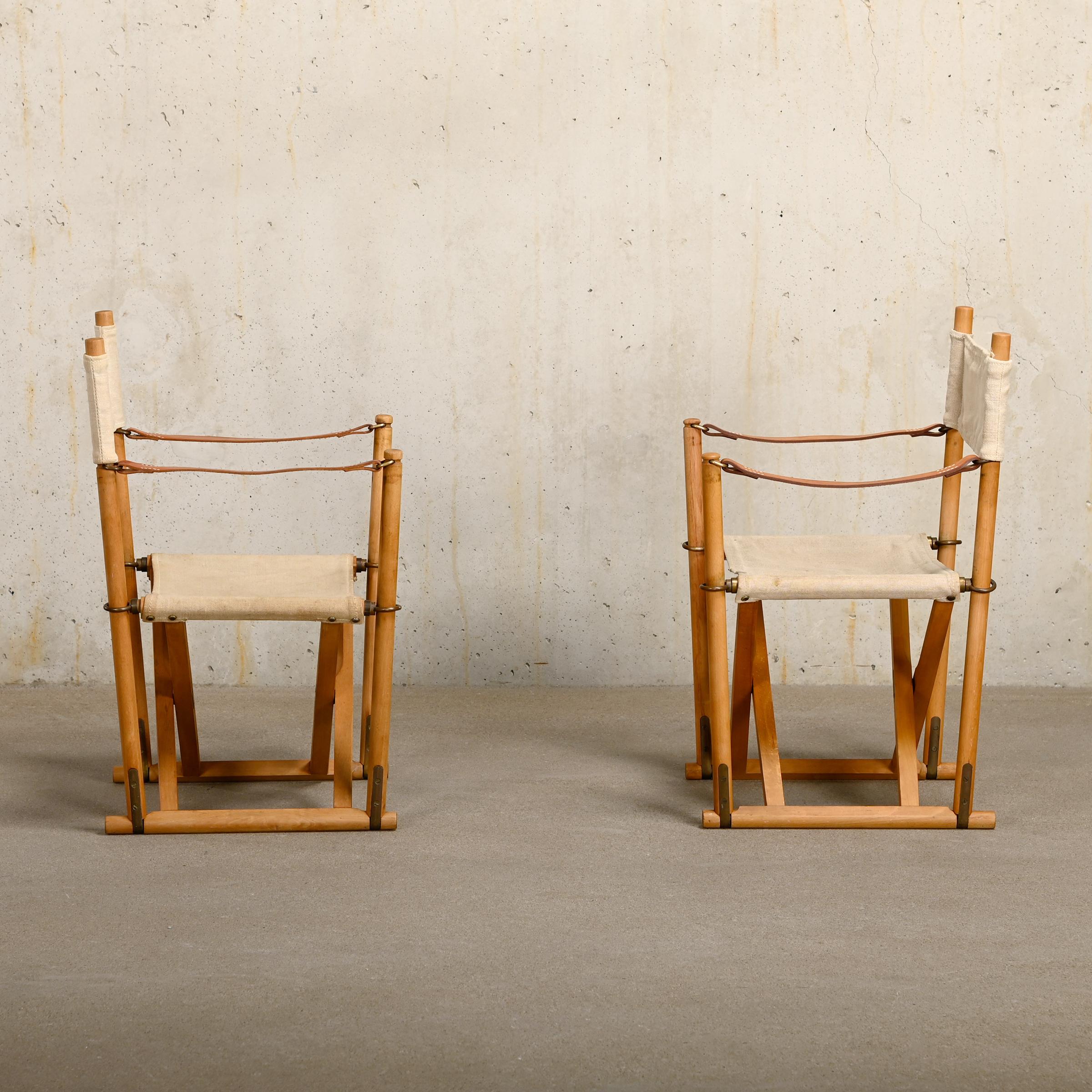 Beautiful made Folding Chairs (model MK16) designed by Mogens Koch in the early thirties. These rare Children's examples are manufactured by Rud Rasmussen and features a beech wood frame with brass fittings and canvas upholstery with full-grain