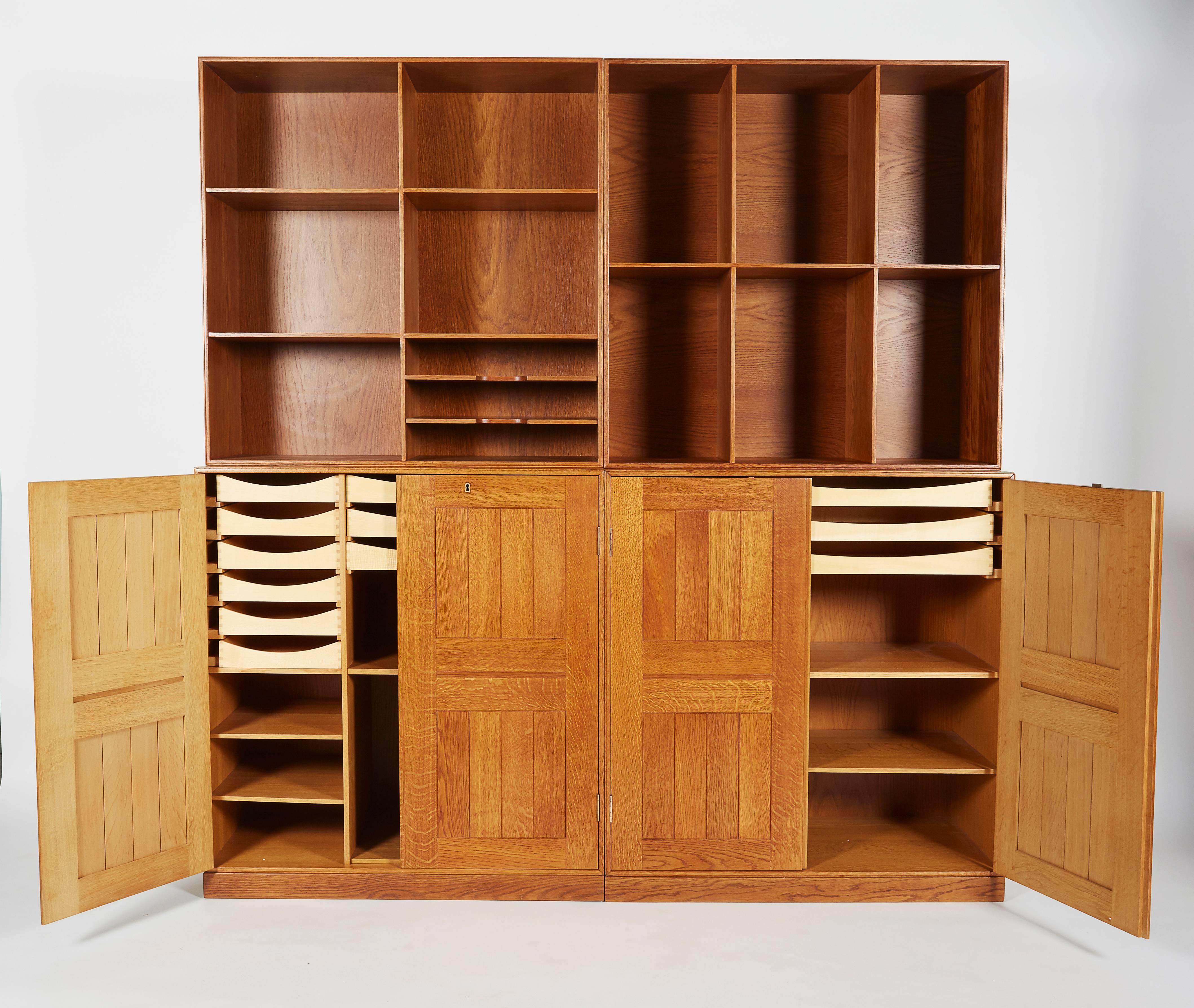 His bookcase was first designed for his own private home and reflected the small rooms in most people's houses that required a flexible bookcase or cabinet. There is an extra base allowing stacking the two bookcases leaving the two cabinets on their