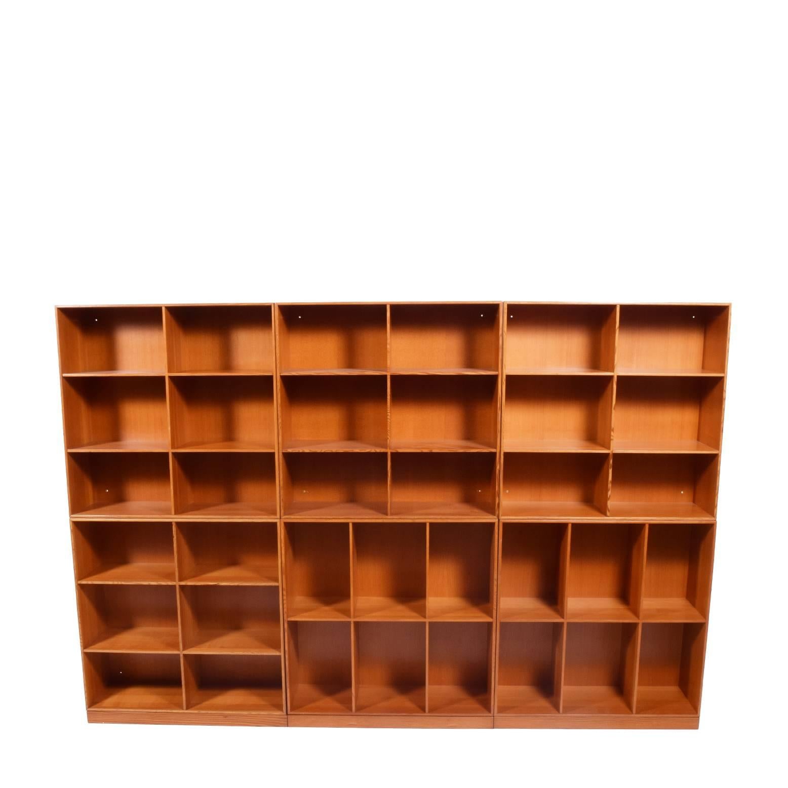 A Danish Classic, solid Oregon pine nine open bookcases all with manufacturing label on the back. Rud Rasmussen originally designed in the 1920s.

Measure: Each cabinet 29.75