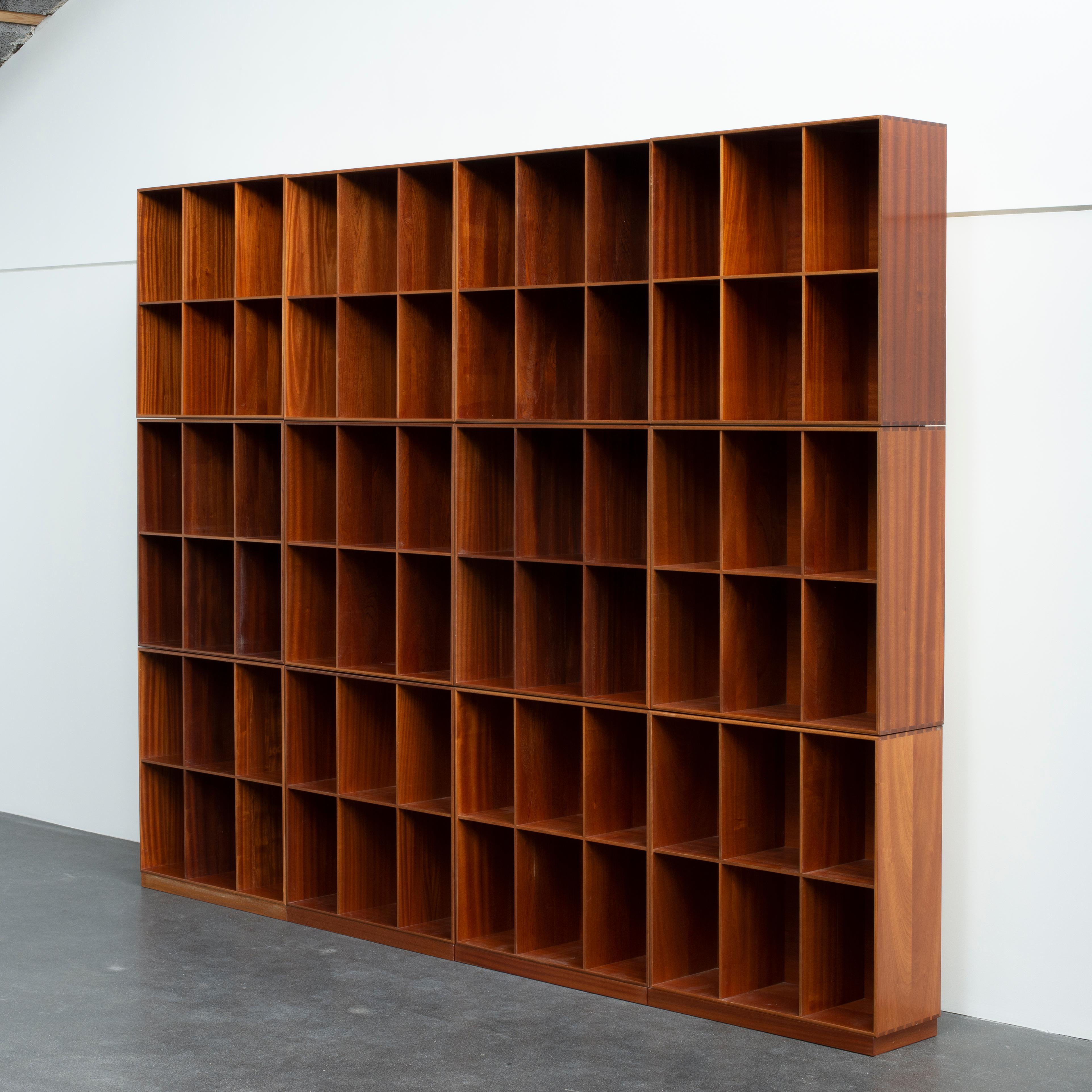 Mogens Koch set of twelve bookcases in mahogany. Executed by Rud Rasmussen.

Reverse with paper labels ‘RUD. RASMUSSENS/SNEDKERIER/KØBENHAVN/DANMARK.