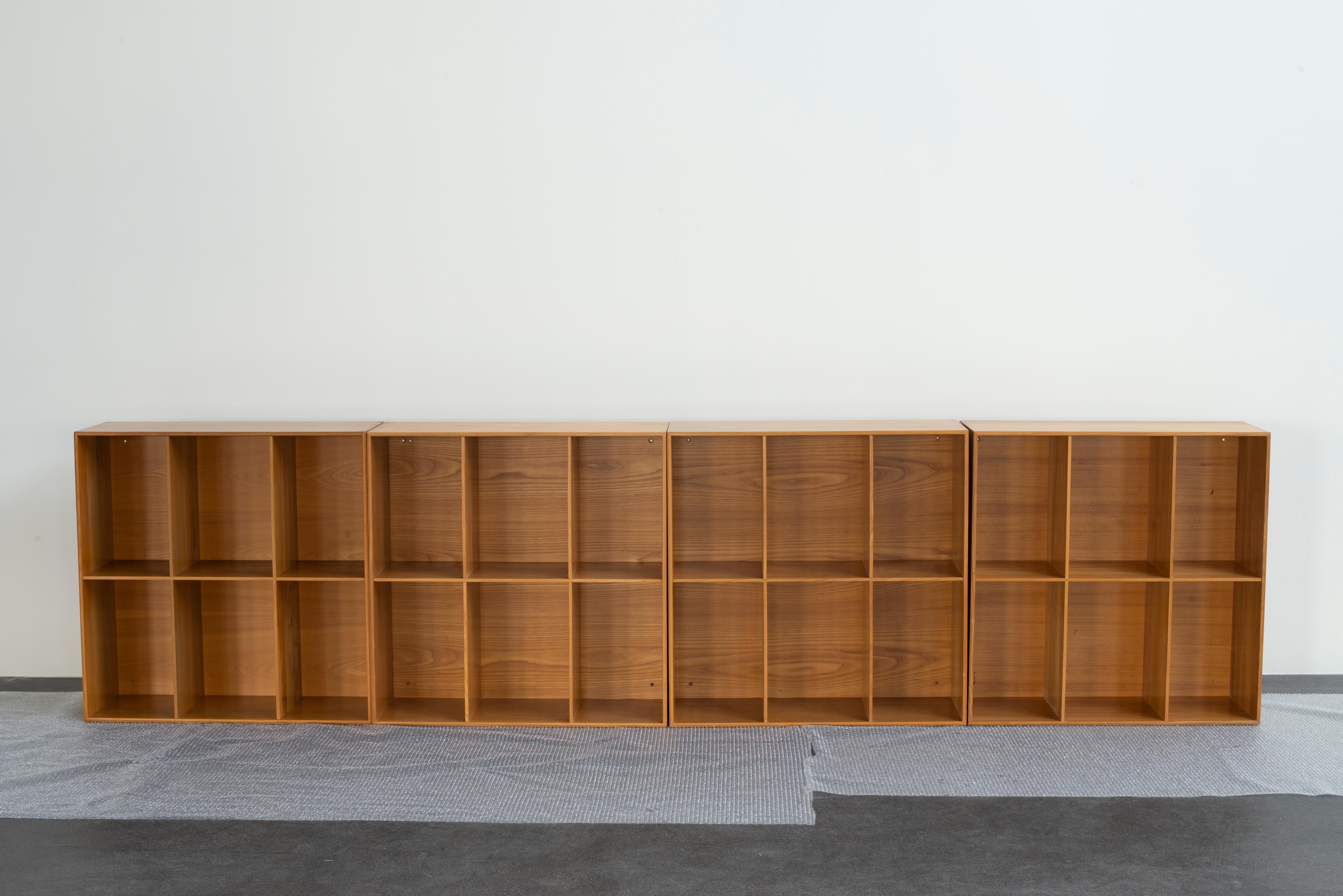 Mogens Koch set of four bookcases in elm. Executed by Rud Rasmussen.

Reverse with paper labels ‘RUD. RASMUSSENS/SNEDKERIER/KØBENHAVN/DANMARK.