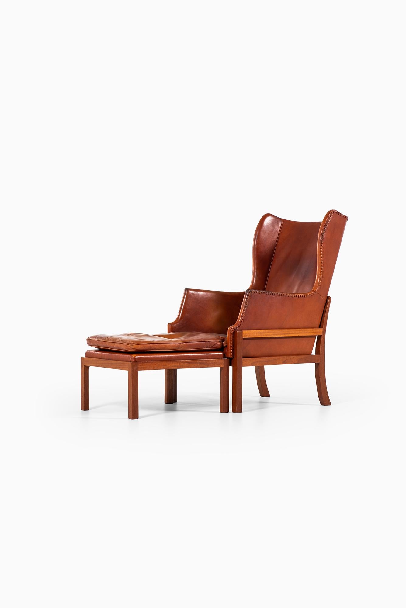 Scandinavian Modern Mogens Koch Wing-Back Lounge Chair with Stool by Cabinetmaker Rud Rasmussen