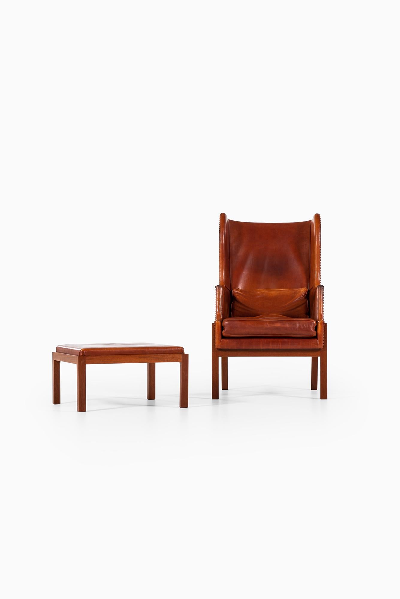 Danish Mogens Koch Wing-Back Lounge Chair with Stool by Cabinetmaker Rud Rasmussen