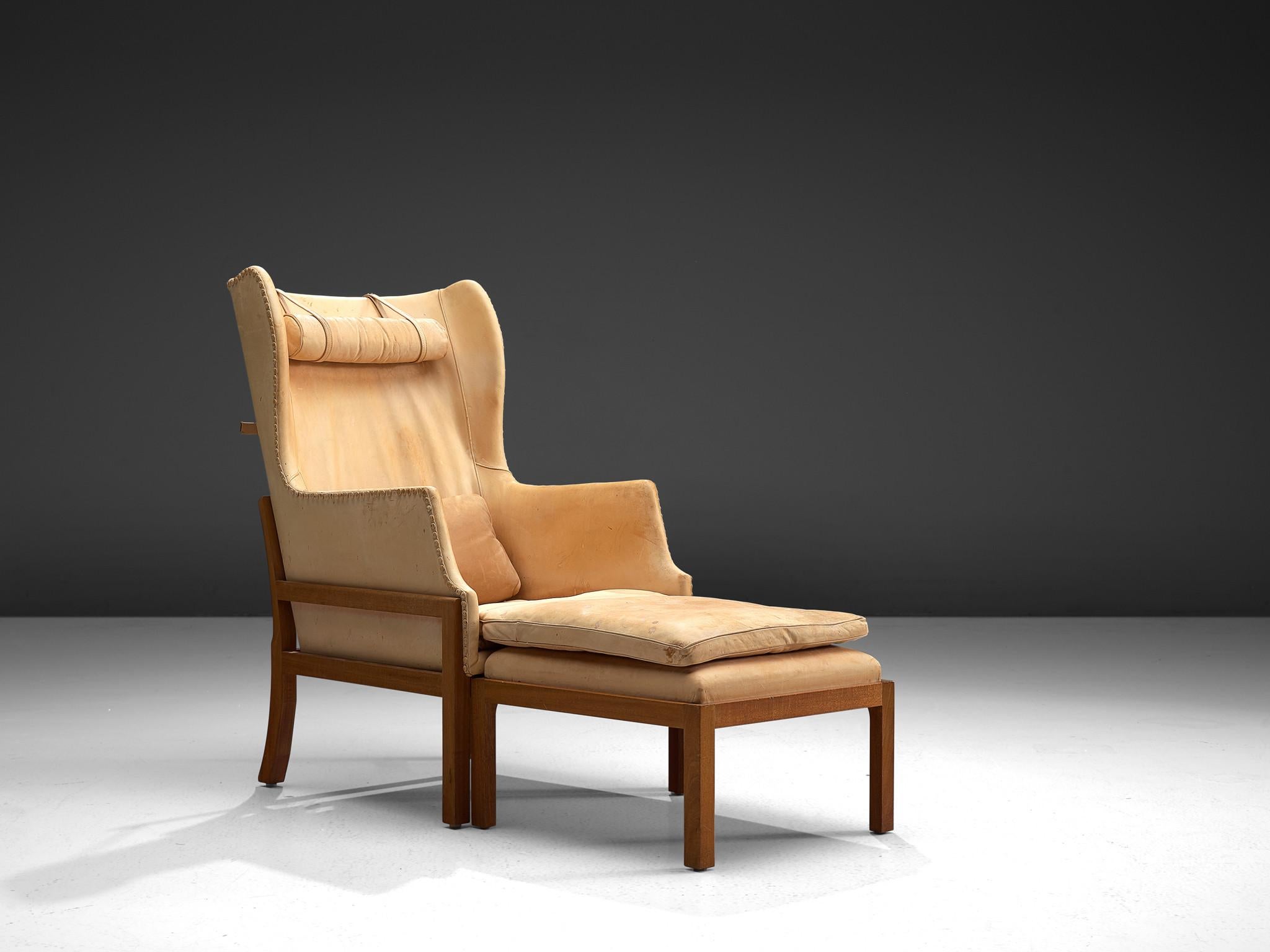 Mogens Koch for Rud Rasmussen, wingback chair and ottoman model MK50, mahogany and leather, Denmark, design 1936, manufactured 1964-1979.

Mogens Koch's wingback chair is inspired by Kaare Klint's furniture design, which in turn is inspired by