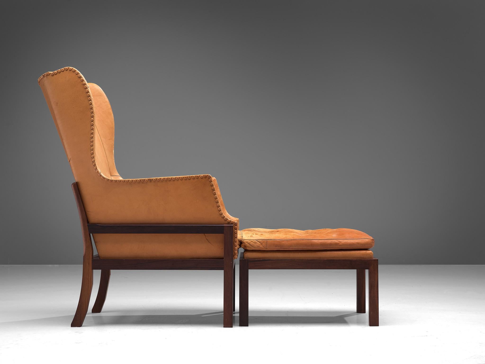 Mid-Century Modern Mogens Koch Wingback Chair and Ottoman in Cognac Leather