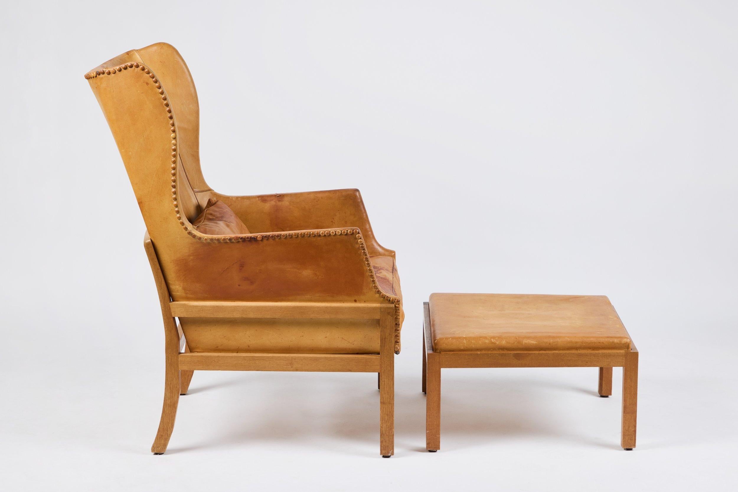 Mogens Koch Wingback Chairs and Ottomans For Sale 1