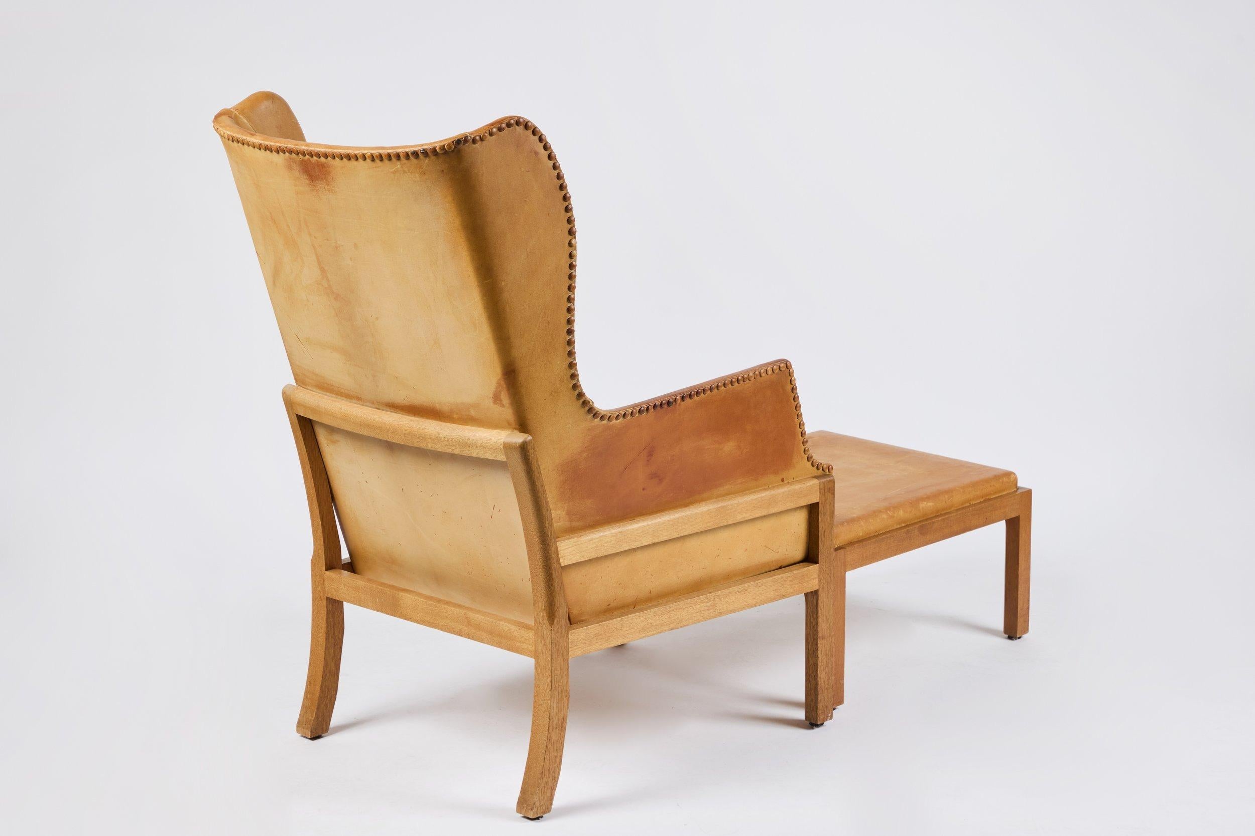 Mogens Koch Wingback Chairs and Ottomans For Sale 3