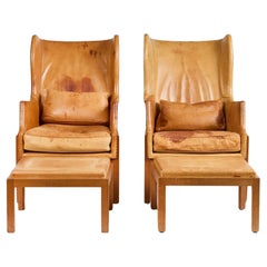 Mogens Koch Wingback Chairs and Ottomans