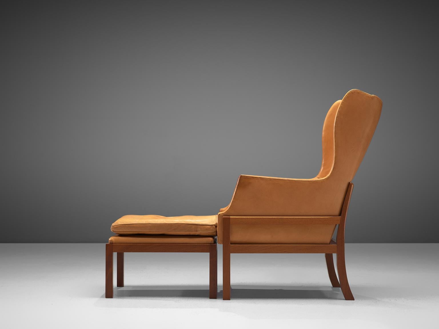 Mid-Century Modern Mogens Koch Wingback Wingback Chair and Ottoman in Mahogany and Cognac Leather