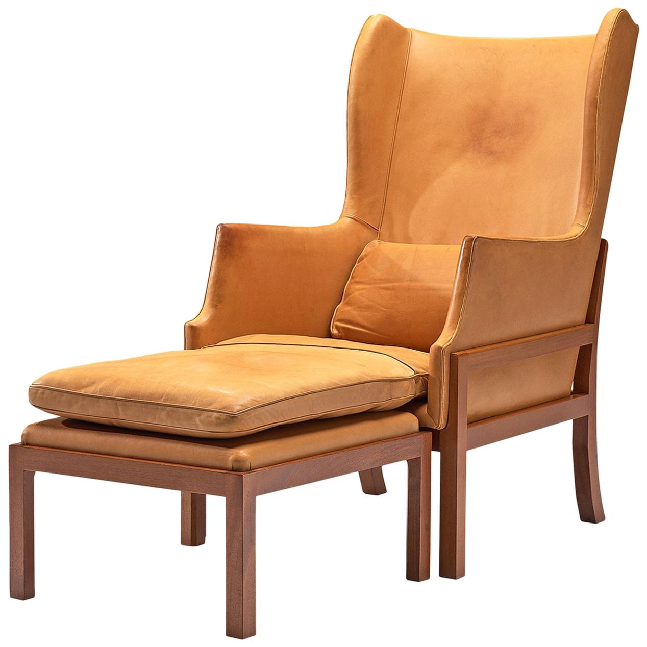 Mogens Koch Wingback Chair and Ottoman in Mahogany and Cognac Leather