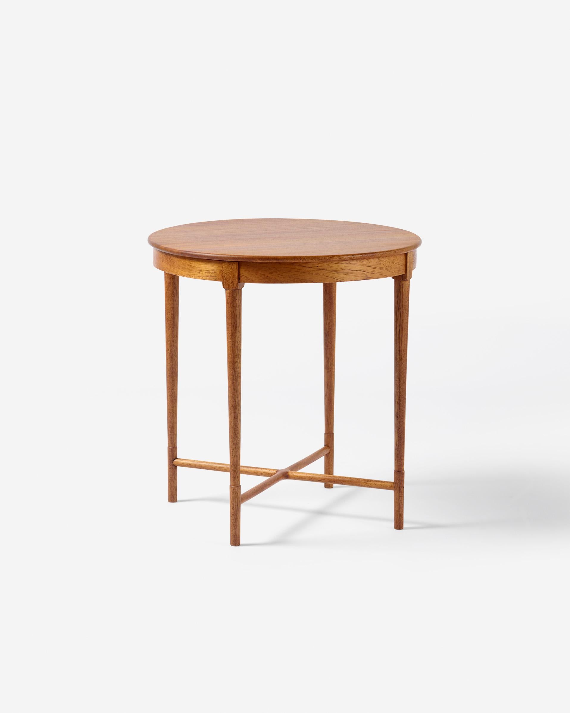 Circular mahogany lamp table, designed in 1947 and made by master cabinetmaker A. J. Iversen.

