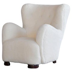 Fauteuil de salon danois à haut dossier en laine d'agneau de style Mogens Lassen des années 1940