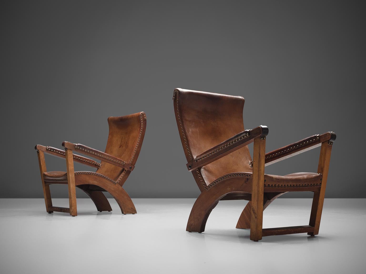 Mogens Voltelen for cabinetmaker Niels Vodder, lounge chair model 'Københavnerstol', teak, walnut, beech, pine, cognac leather, Denmark, 1936

This 'Copenhagen' lounge chair was designed by Mogens Voltelen in 1936. The walnut frame features inlayed