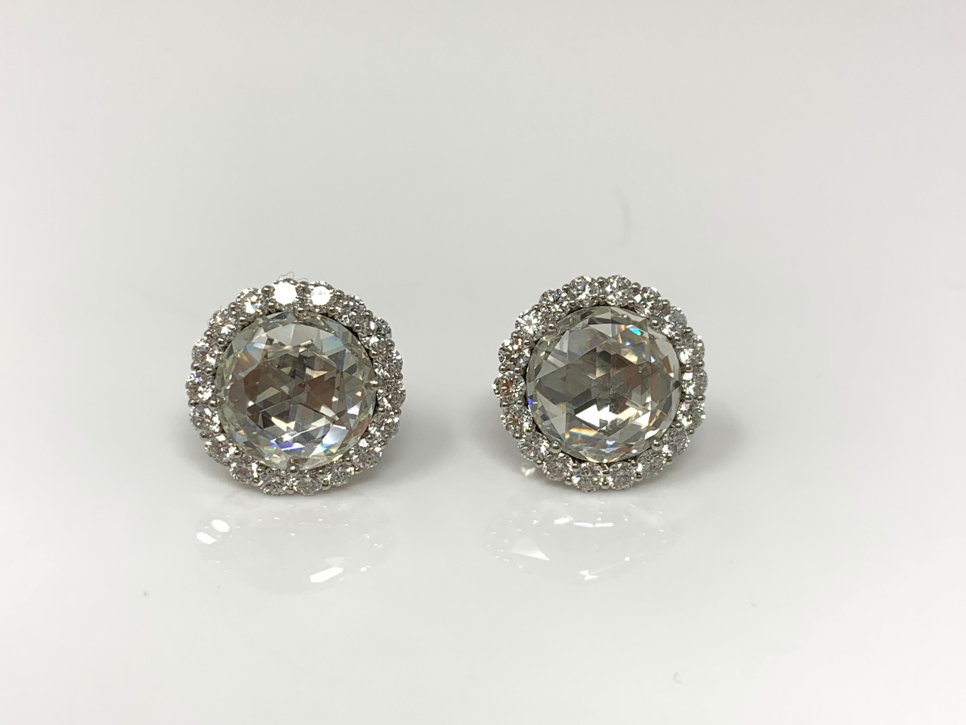 This gorgeous and classy pair of white rose cut diamond stud earrings showcase two white rose cut diamonds, 5.07 carat with K color and VS1 clarity and the other beautifully matched white rosecut diamond weighing 5 carat with K color and VVS2