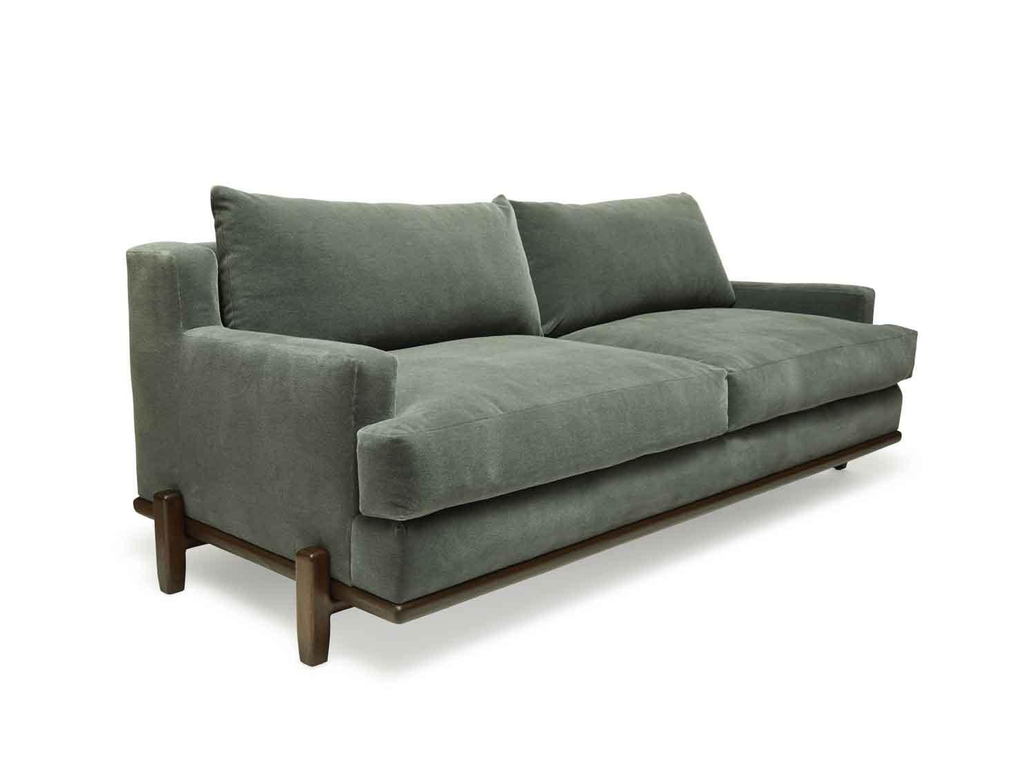 The George sofa is part of the collaborative collection with interior designer Brian Paquette. The low profile silhouette sits above a sculpted solid wood base. This piece is available in exclusive BP for LF finishes as well as the standard