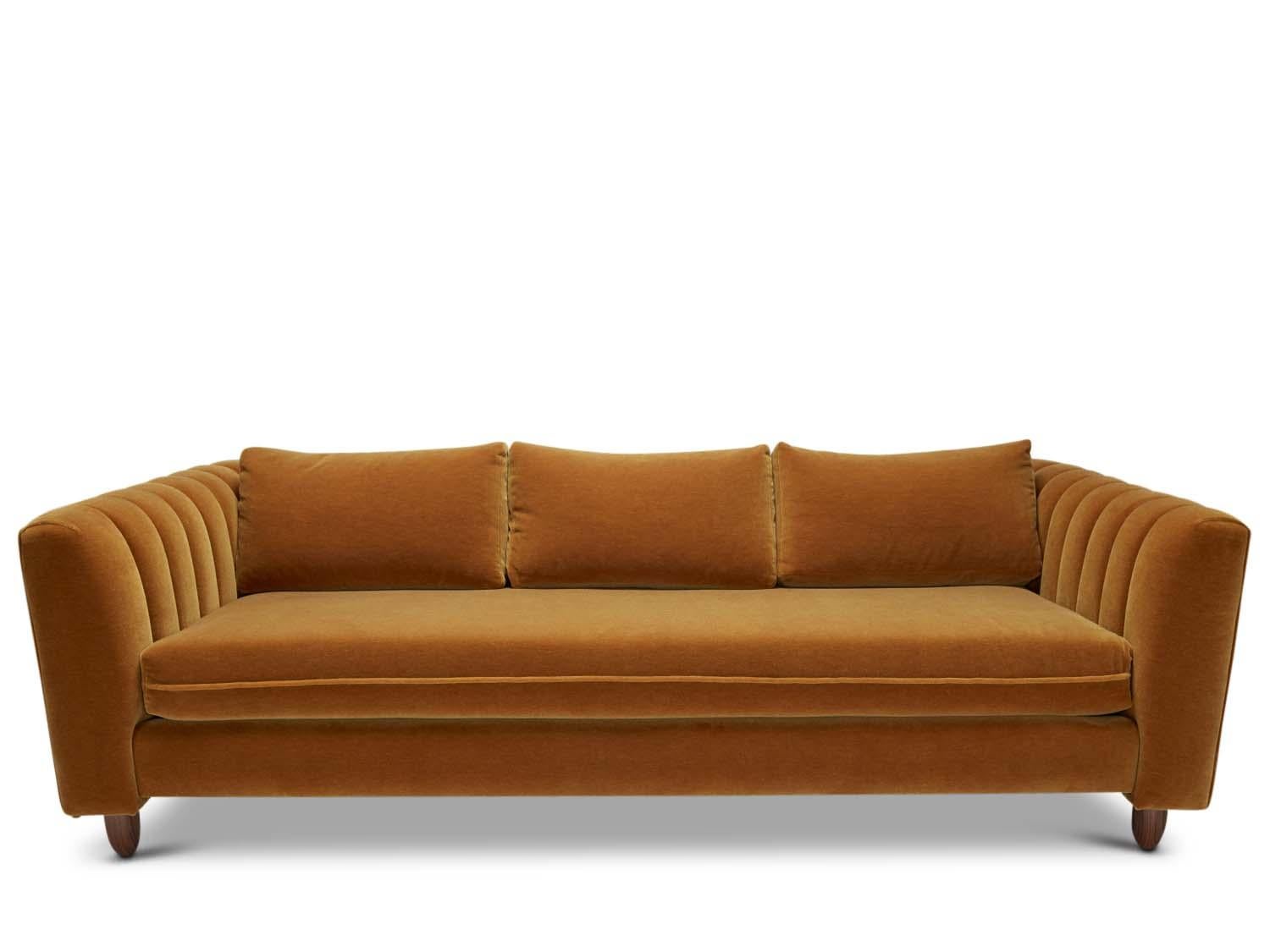 The isherwood sofa features a channel tufted body with loose bolster cushions. The turned legs are made of solid white oak or American walnut and are inset on the sides revealing the leg detail. 

The Lawson-Fenning Collection is designed and
