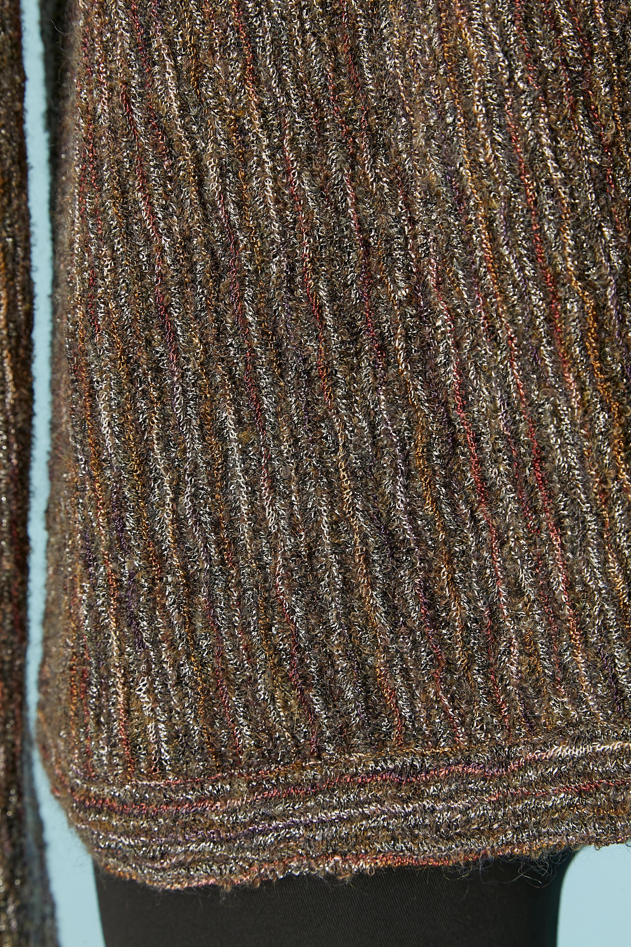 Wool jacquard and lurex cardigan . No closure. Knit composition: 35% mohair, 21% rayon, 19% metalic, 19% nylon, 6% wool . Shoulder-pad. 
SIZE L 