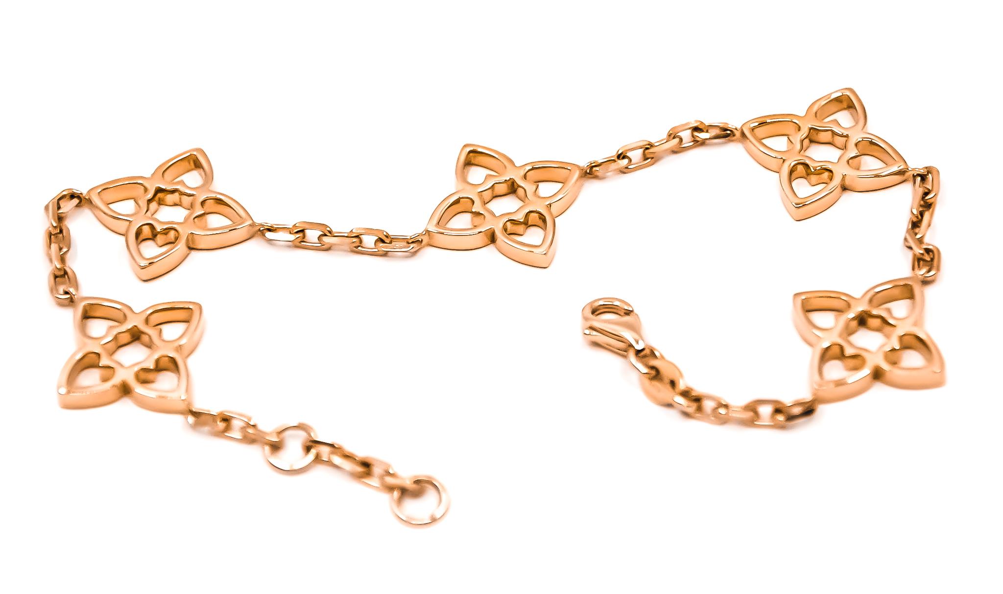 18kt solid rose gold 5 motif bracelet by Mohamad Kamra from the Connected Hearts Collection.

Bracelet can be made in any wrist size.