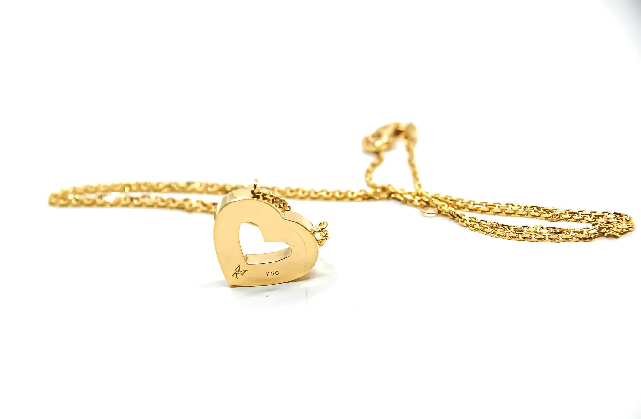 18kt solid yellow gold pendant necklace by Mohamad Kamra from the Heart Collection.

