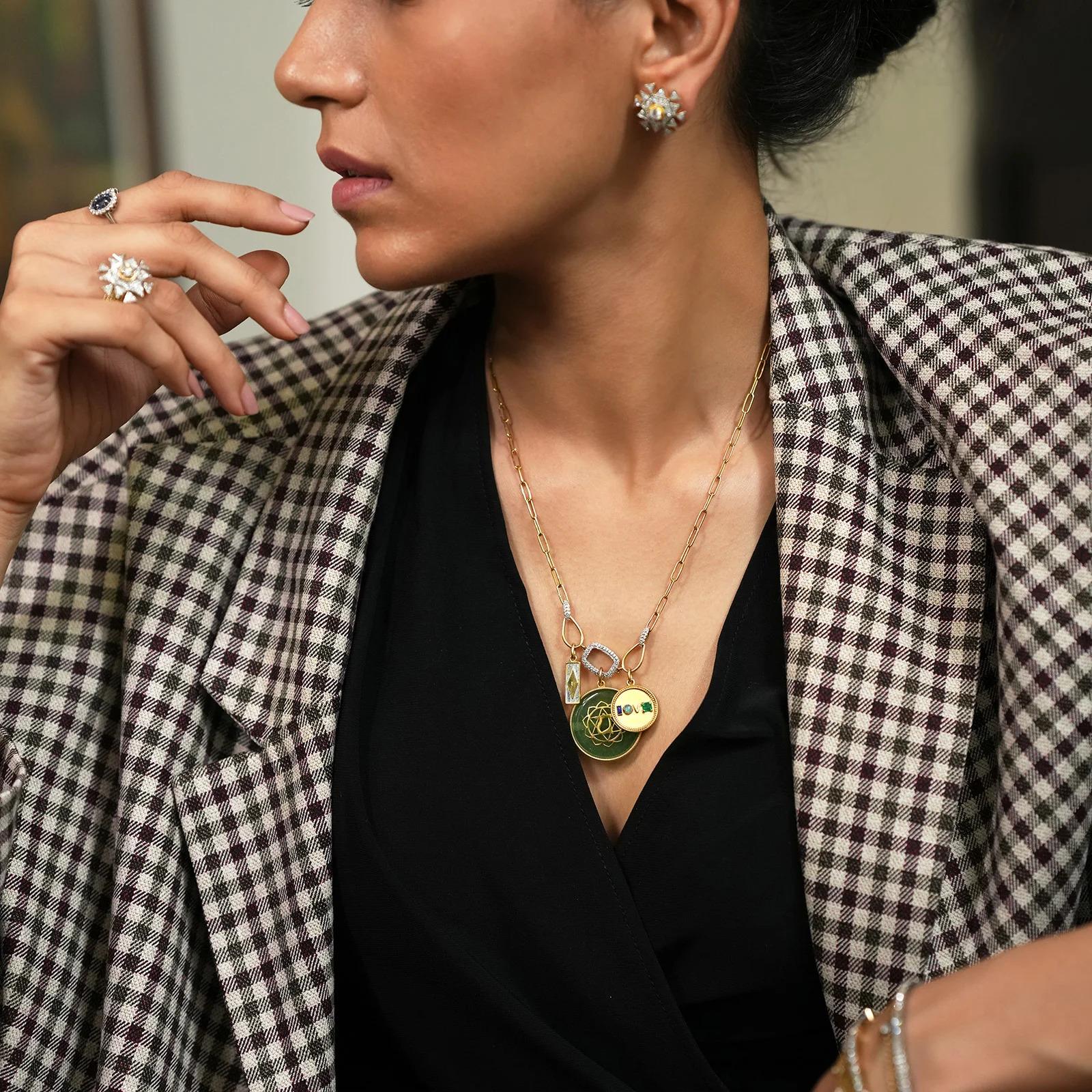Gold(14K) : 14.15g
Diamonds : (VS clarity & H-I colour): (Brilliant cut ) : 0.35ct
Gemstones : Aventurine, Emerald, Opal, Lapiz Lazuli

Anah Spring Pendant Necklace is a celebration of all things Love—love for yourself, for your dear ones, and for