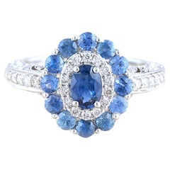 Moi Azure Gold Diamond and Halo Sapphire Engagement Ring