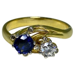 Retro Toi et Moi 0.60ct Ceylon Sapphire & Diamond Crossover Ring in 18k Gold