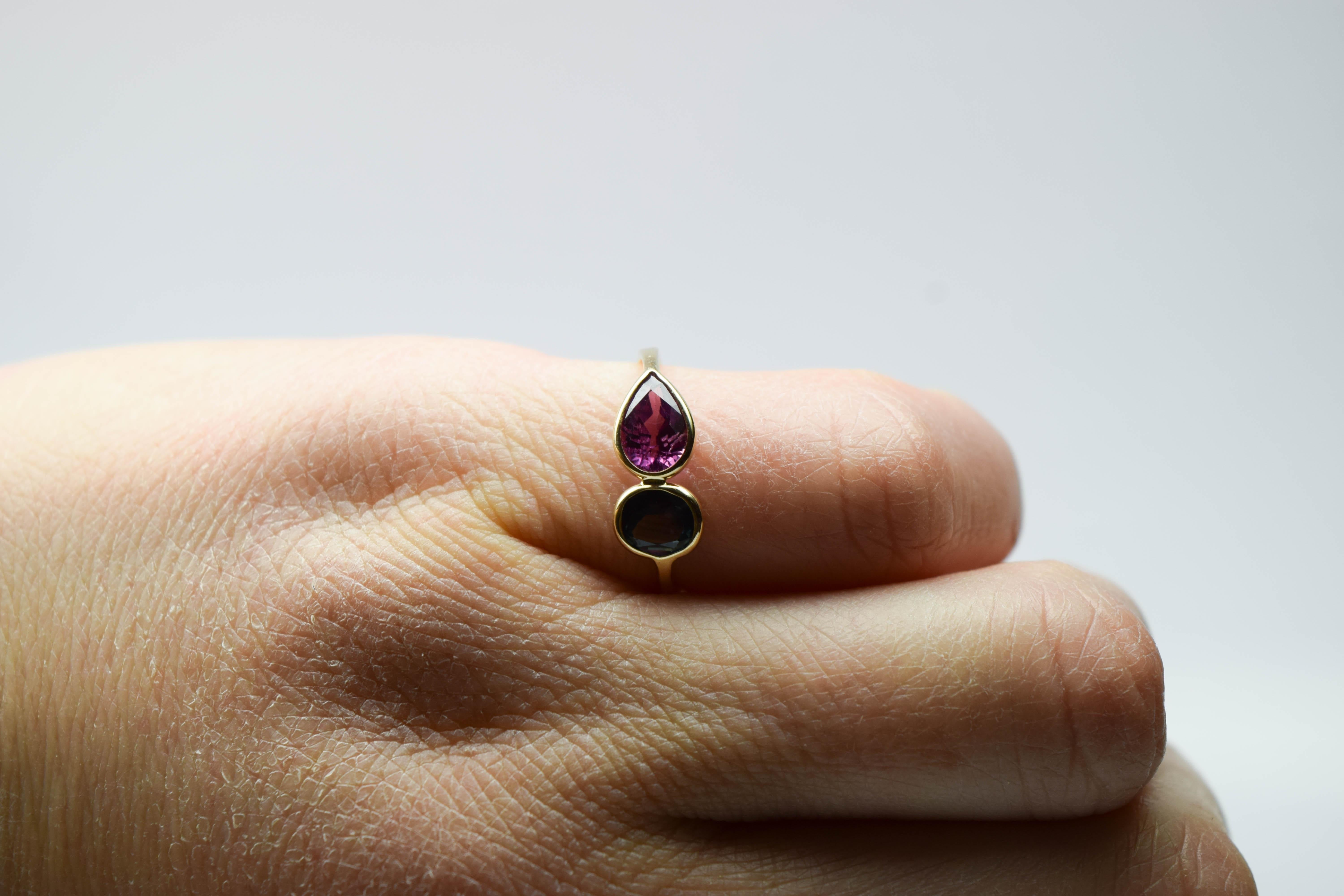 Certified Pink Sapphire and Teal Sapphire ring in 14KT yellow gold, very different type of ring with completely open space under ring, the ring is made by hand and finished by hand as well. The stones are rare and very beautiful in colors!
Metal