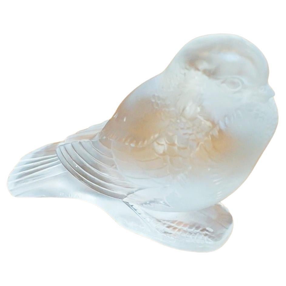 Moineau Fier, an Art Deco glass paperweight. A proud sparrow in frosted glass set on an integral base. Model number 1149. R Lalique France raised to side.
 