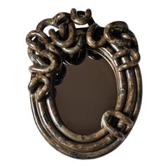 Espejo autorretrato de gres esmaltado moaré marrón-bronce de Clémentine Dupré.