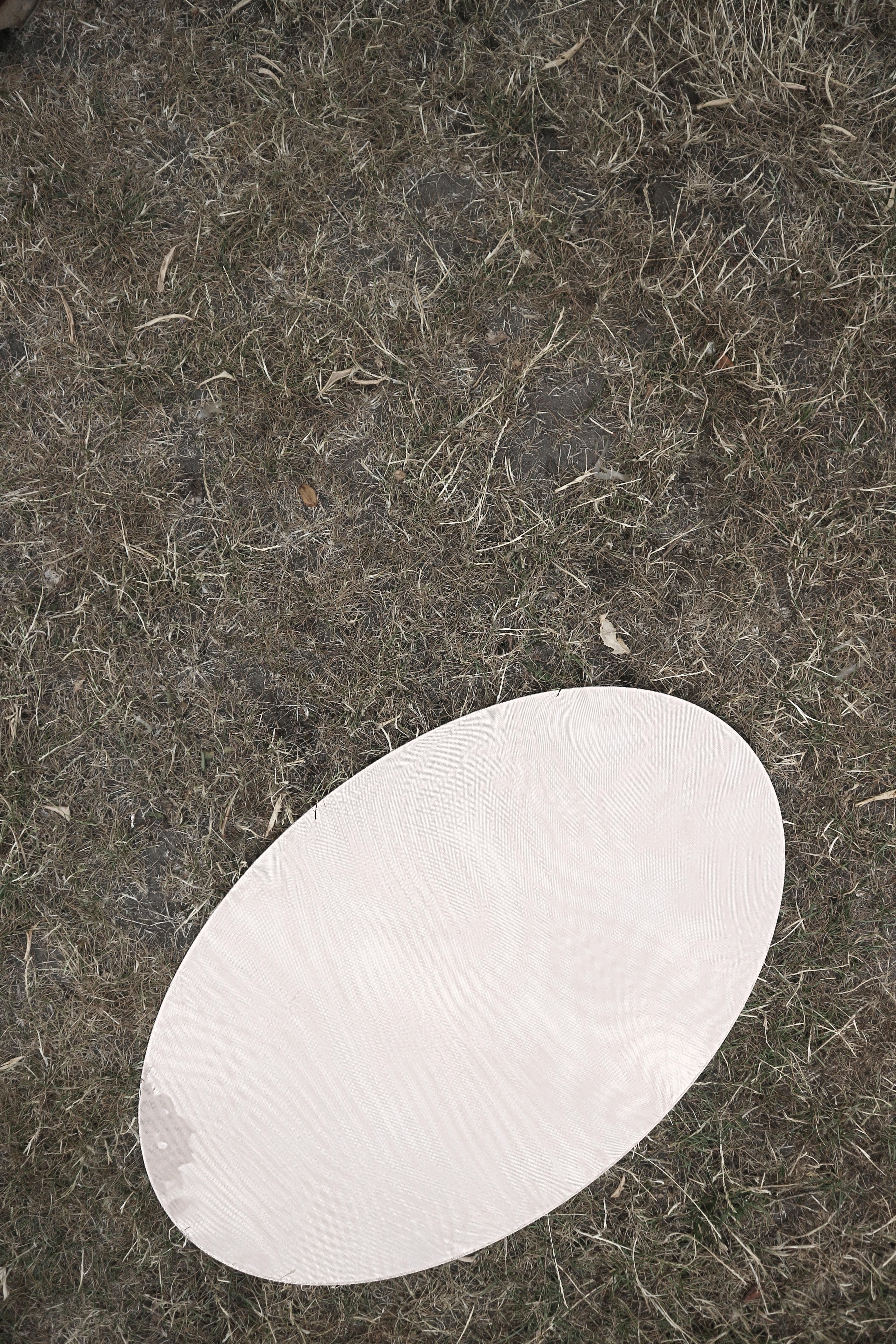 Moiré oval mirror by Kajsa Willner
Dimensions: 50 x 1.6 x 80 cm
Materials: Mirror, polyester

Playing with imperfect alignments, a small displacement, rotation or difference in the period to make interference patterns occur that lead to the