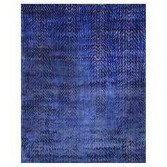 Tapis contemporain MOIRE noué à la main dans les couleurs bleu, ivoire et gris par Hands