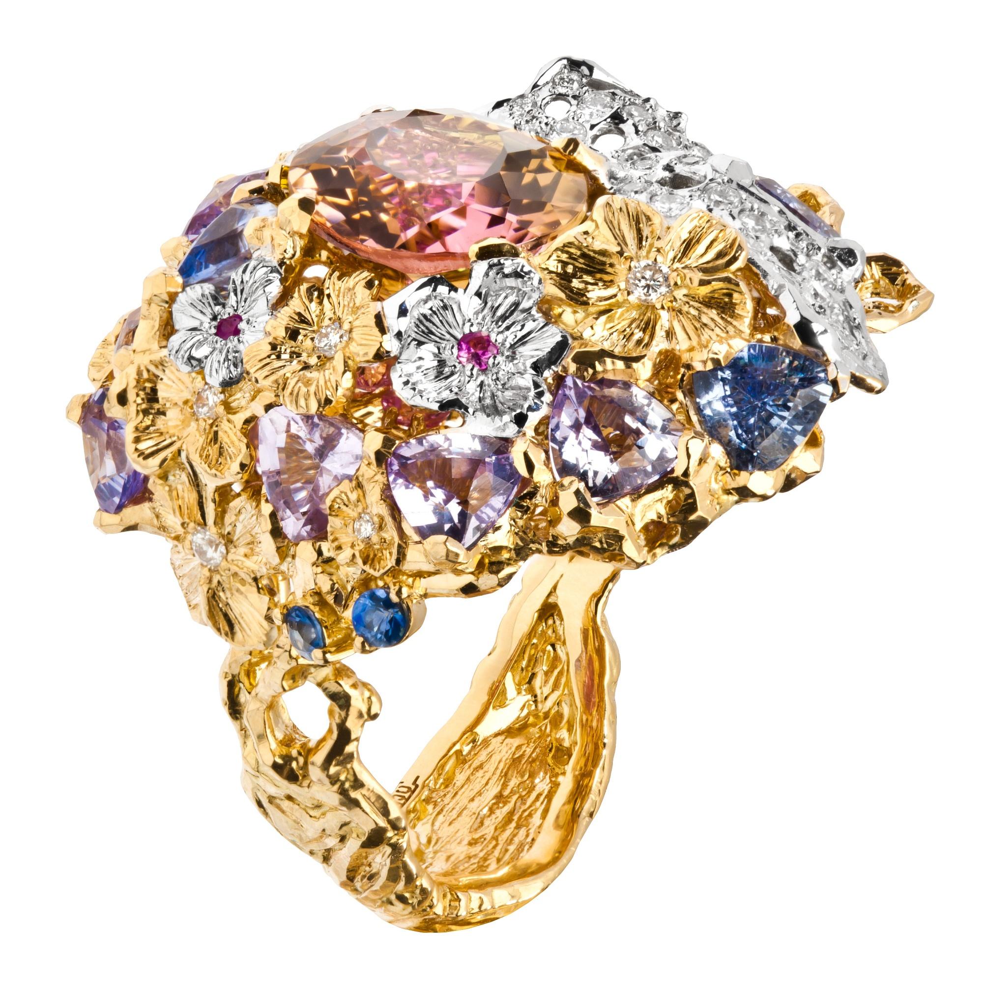 Inspired by Impressionism, MOISEIKIN® has created a blooming flower ring in a tridimensional manner. Trembling flowers and the sweet fragrance of coming ripe fruits are embodied in precious gemstones and metal. Between two layers of yellow and white