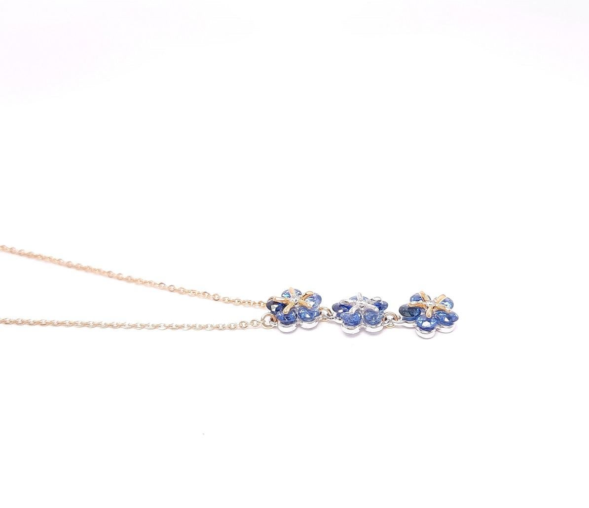 Diamond-cut blue sapphires are mounted carefully in delicate flower design, applied in the innovative stone setting technology.  Swinging flowers of sapphires shine extraordinarily, trembling for the joy of Spring.

Internationally patented,