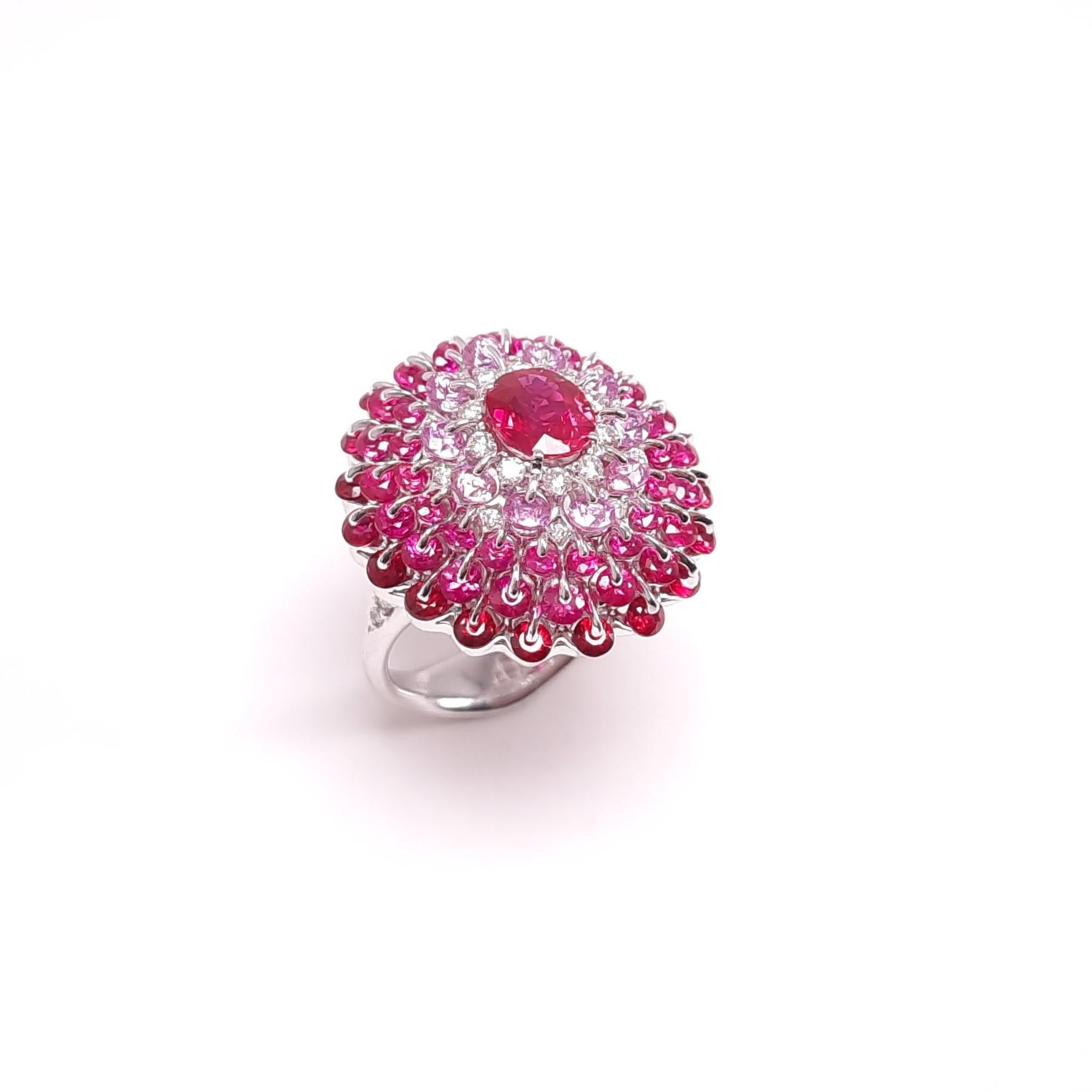 Rubies, pink sapphires and diamonds create a dynamic performance as a graceful ballerina with internationally patented stone technology. Exclusively selected, 1.14 ct  radiant Mozambique Ruby, is decorated with the perfect graduation of diamonds,
