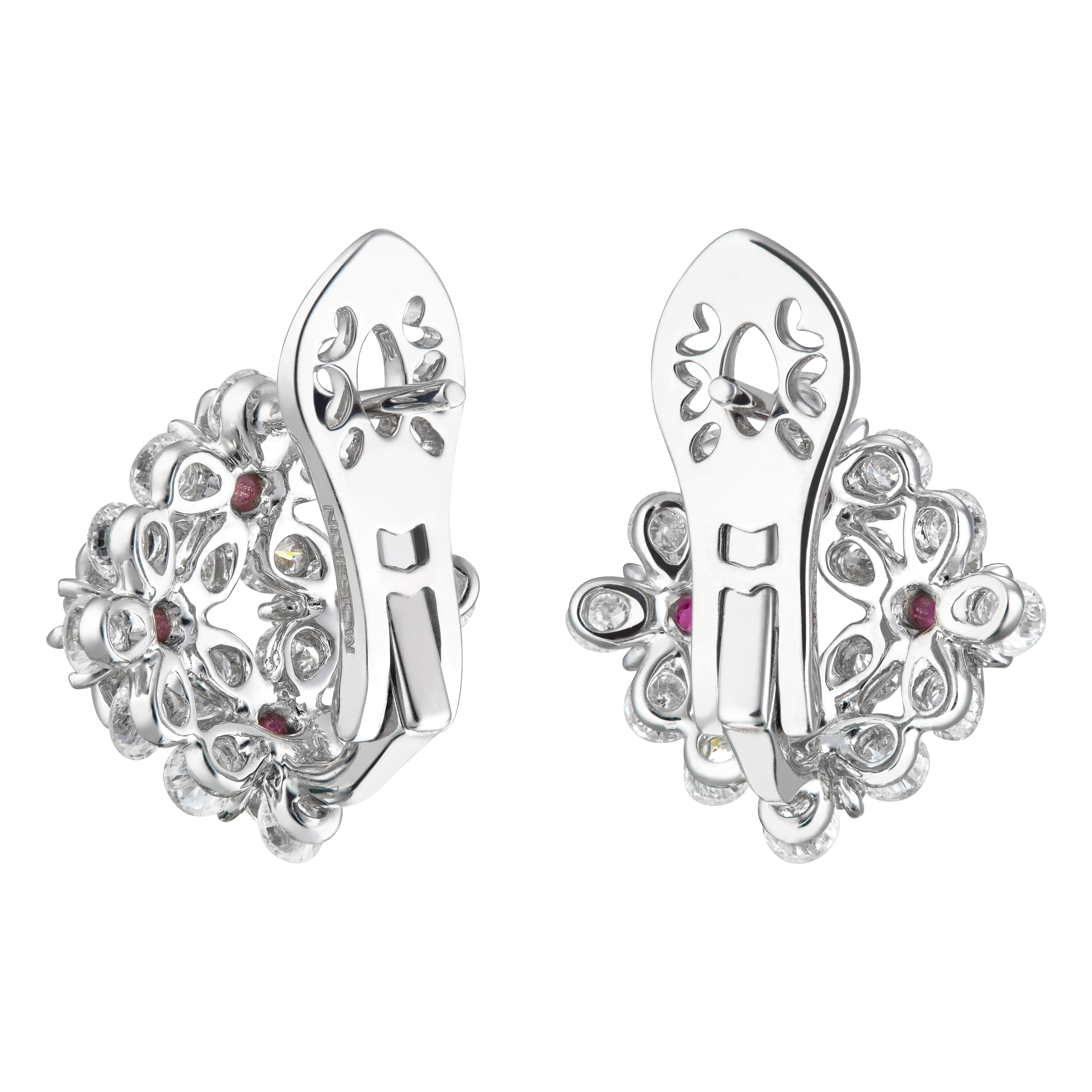 Symbol of remembrance and eternal love, the Forget-Me-Not flower has become an everlasting flower. This innovative pair of earrings made in 18 karat white gold, over 2ct diamonds and rubies are mounted in MOISEIKIN's Waltzing Brilliance technology